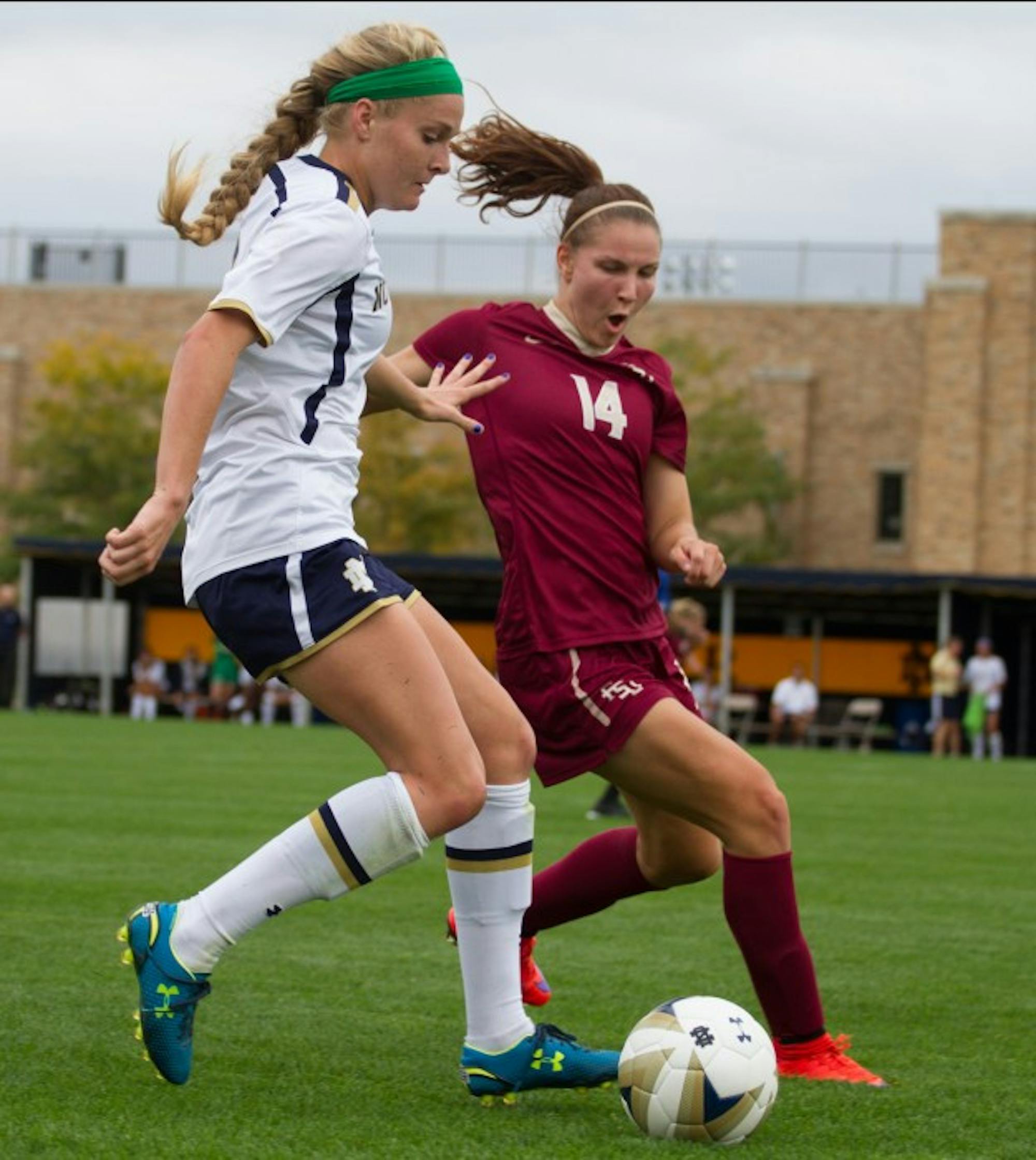 Freshman forward Natalie Jacobs dribbles the ball past the defender during Notre Dame’s 1-0 overtime loss to Florida State at Alumni Stadium on Sunday.