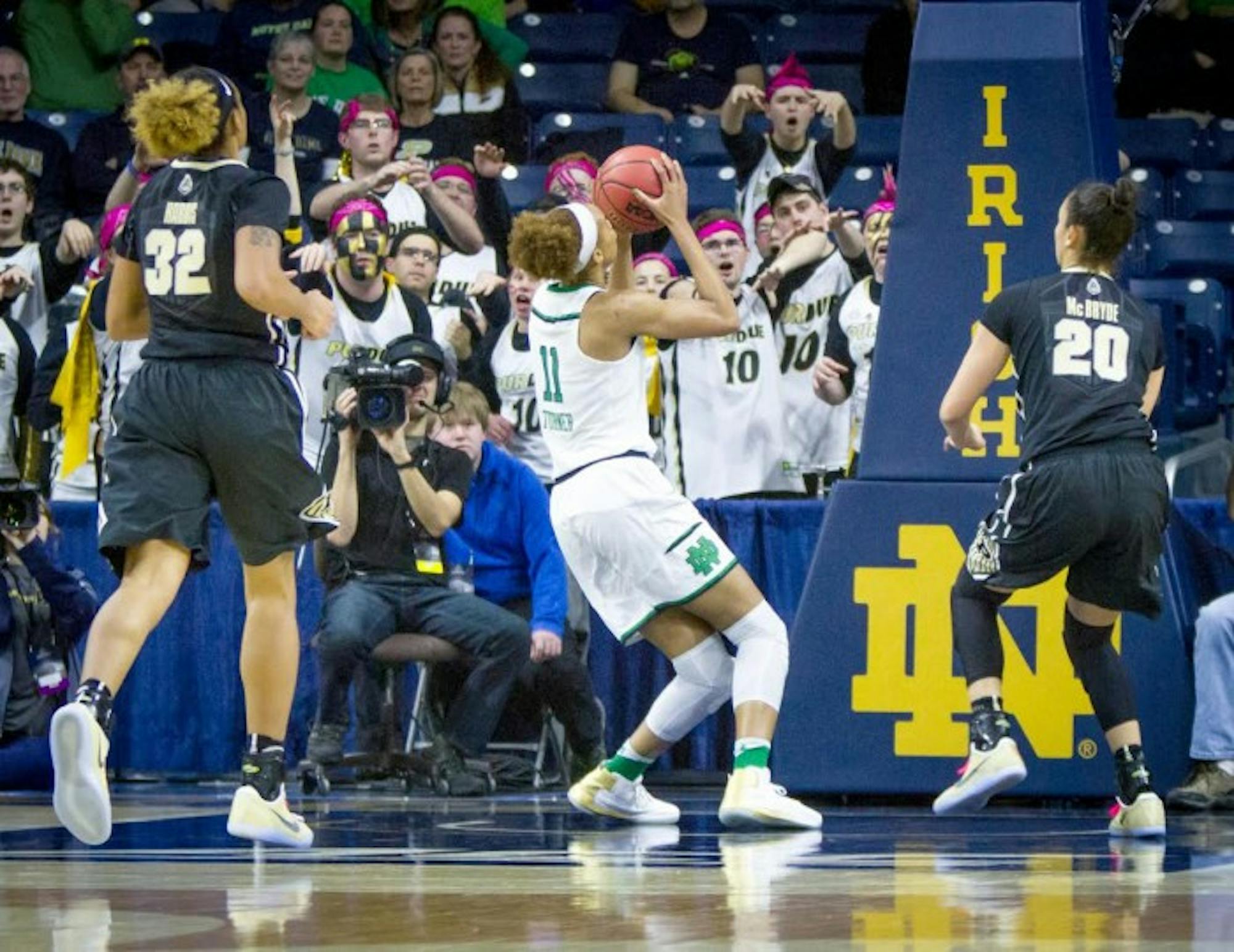 Irish junior forward Brianna Turner catches a pass and looks towards the basket during Notre Dame’s 88-82 win over Purdue on Sunday at Purcell Pavilion. Turner injured her left knee on the play, and she is scheduled for an MRI on Monday.