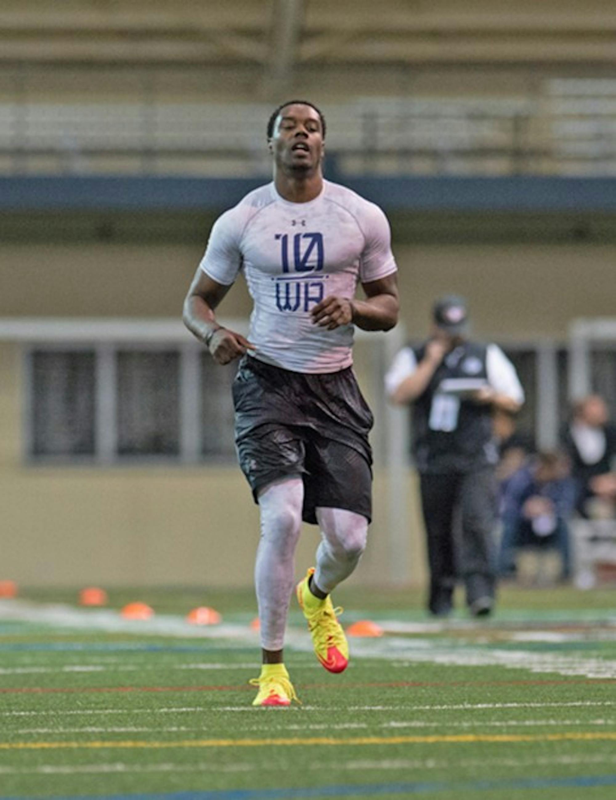 Former Irish wide receiver DaVaris Daniels slows up after a 40-yard dash attempt during Notre Dame's Pro Day at Loftus Sports Center yesterday.
