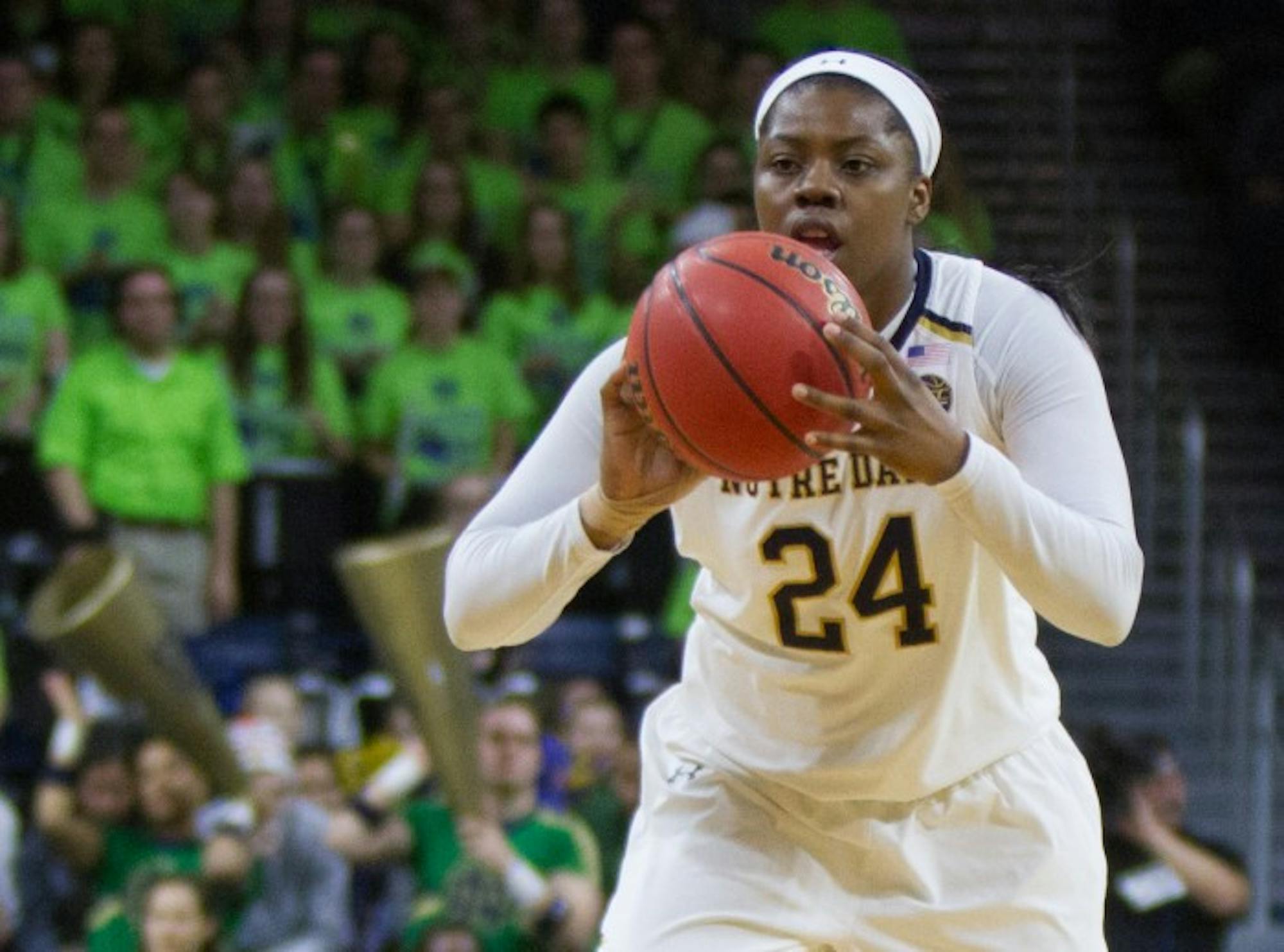 Irish sophomore guard Arike Ogunbowale looks to make a pass during Notre Dame's win over Virginia on Sunday at Purcell Pavilion.