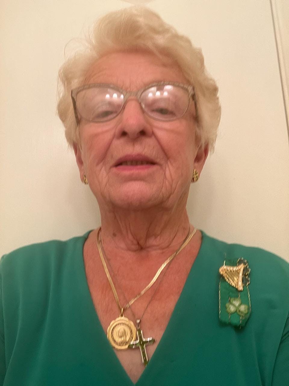 A selfie of the author's grandmother celebrating St. Patrick's Day