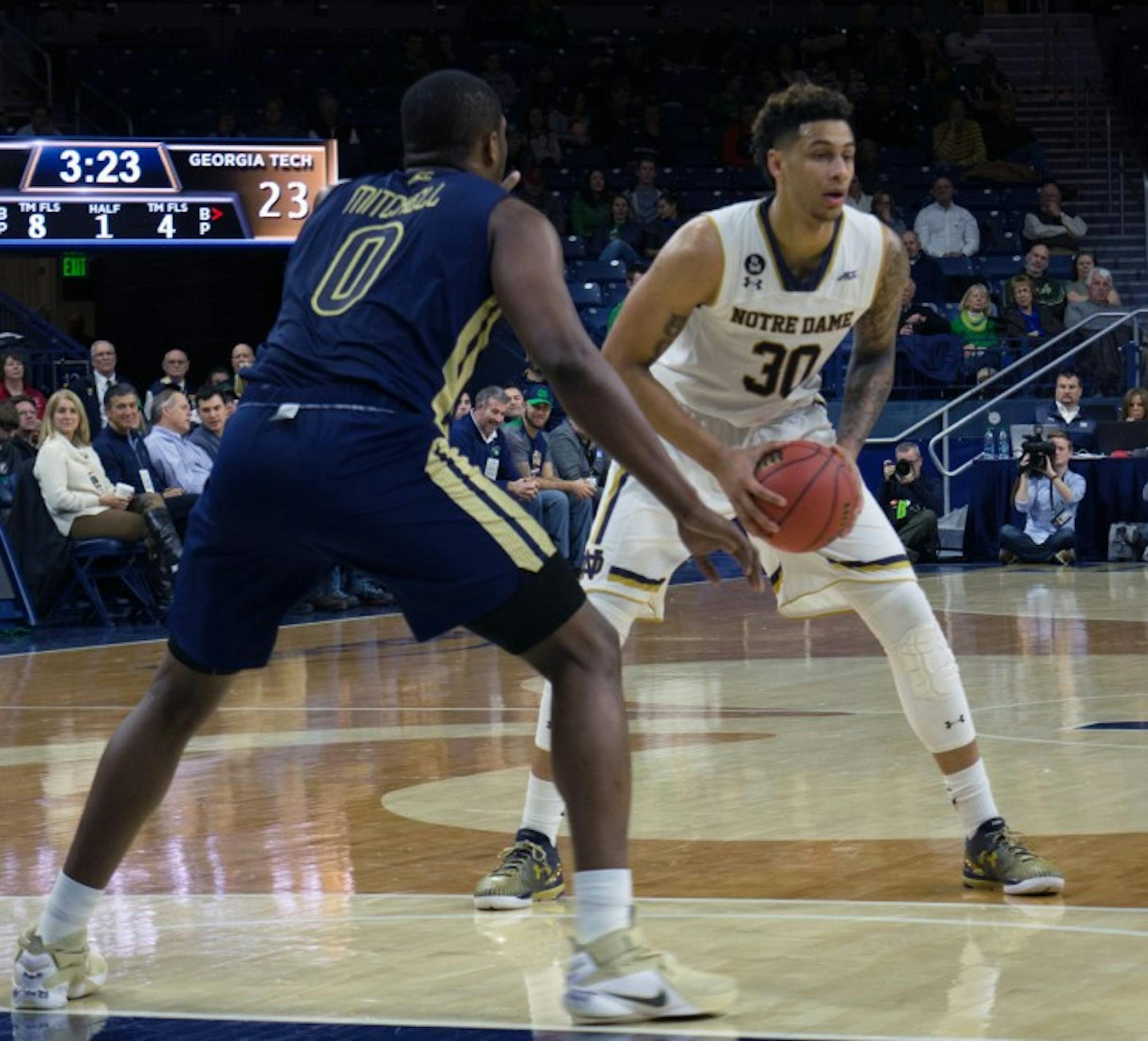 Senior forward Zach Auguste looks to pass during Notre Dame’s 72-64 victory over Georgia Tech on Wednesday at Purcell Pavilion.  Auguste led the team with 24 points and nine rebounds.
