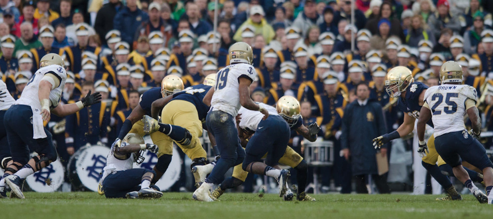 Navy junior quarterback Keenan Reynolds (19) directs the prolific Midshipmen triple option rushing attack against the Irish in Notre Dame’s 38-34 win over the Midshipmen in 2013 at Notre Dame Stadium. Reynolds has rushed for 639 yards and 11 touchdowns in six games this season.