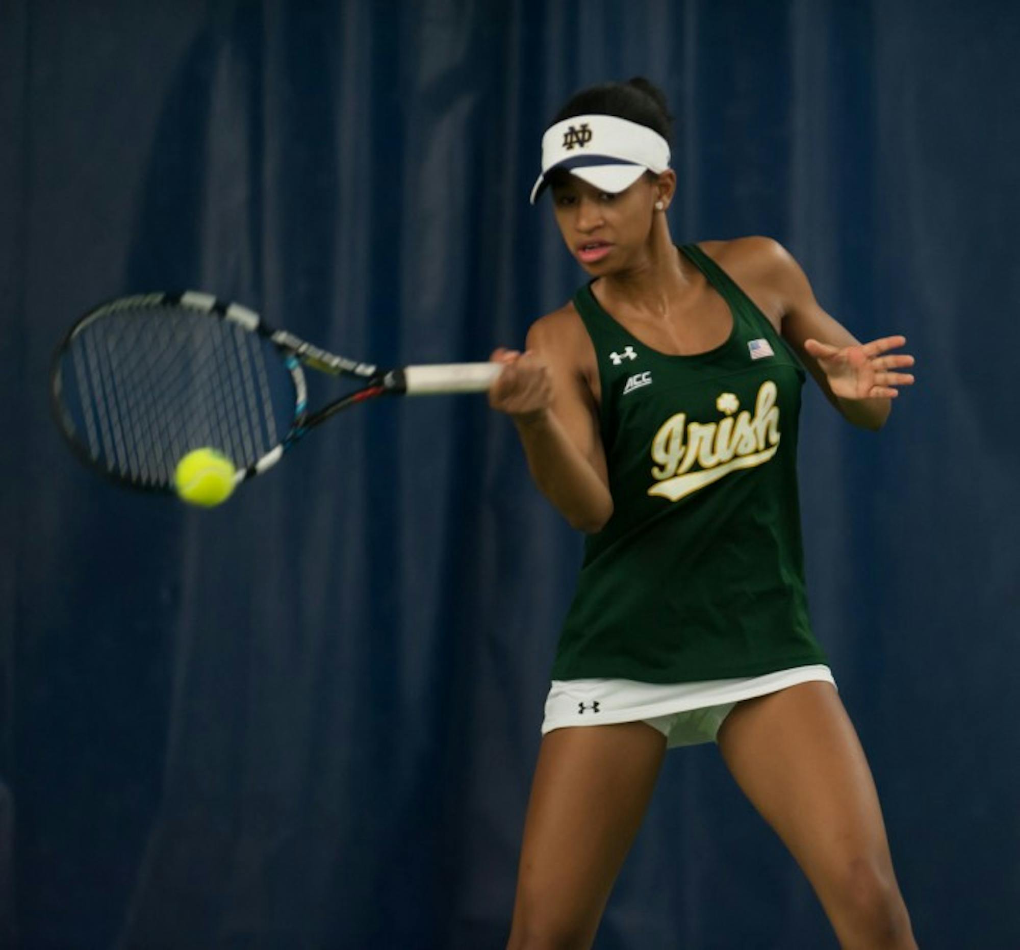 Irish freshman Zoe Spence hits a forehand during Notre Dame’s 5-2 win over Purdue on Feb. 22 at Eck Tennis Pavilion.