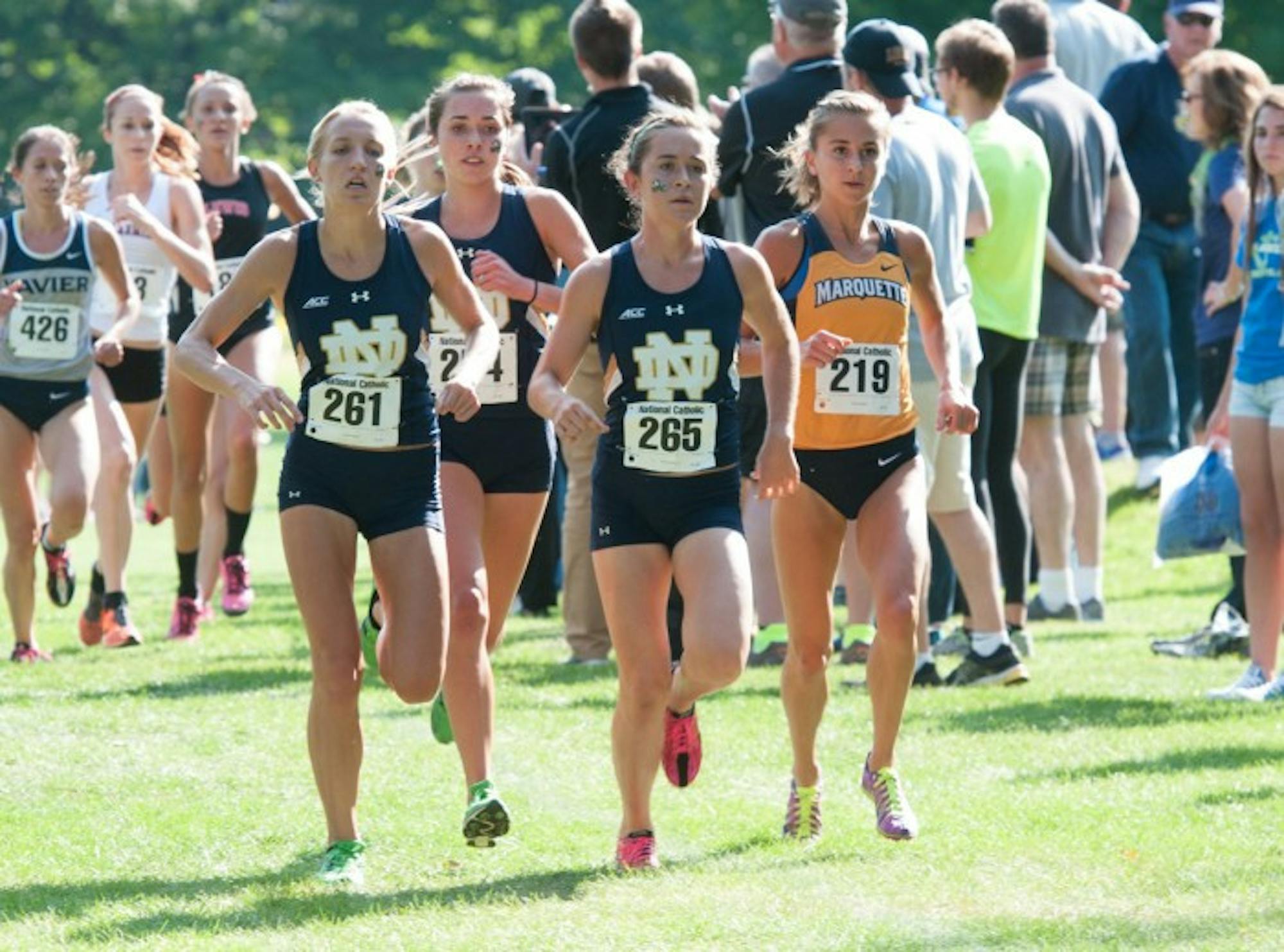 Senior Molly Seidel leads the pack before finishing first at the National Catholic Championships on Sept. 19, 2014. Senior Danielle Aragon finished second, and the Irish won the team title outright.