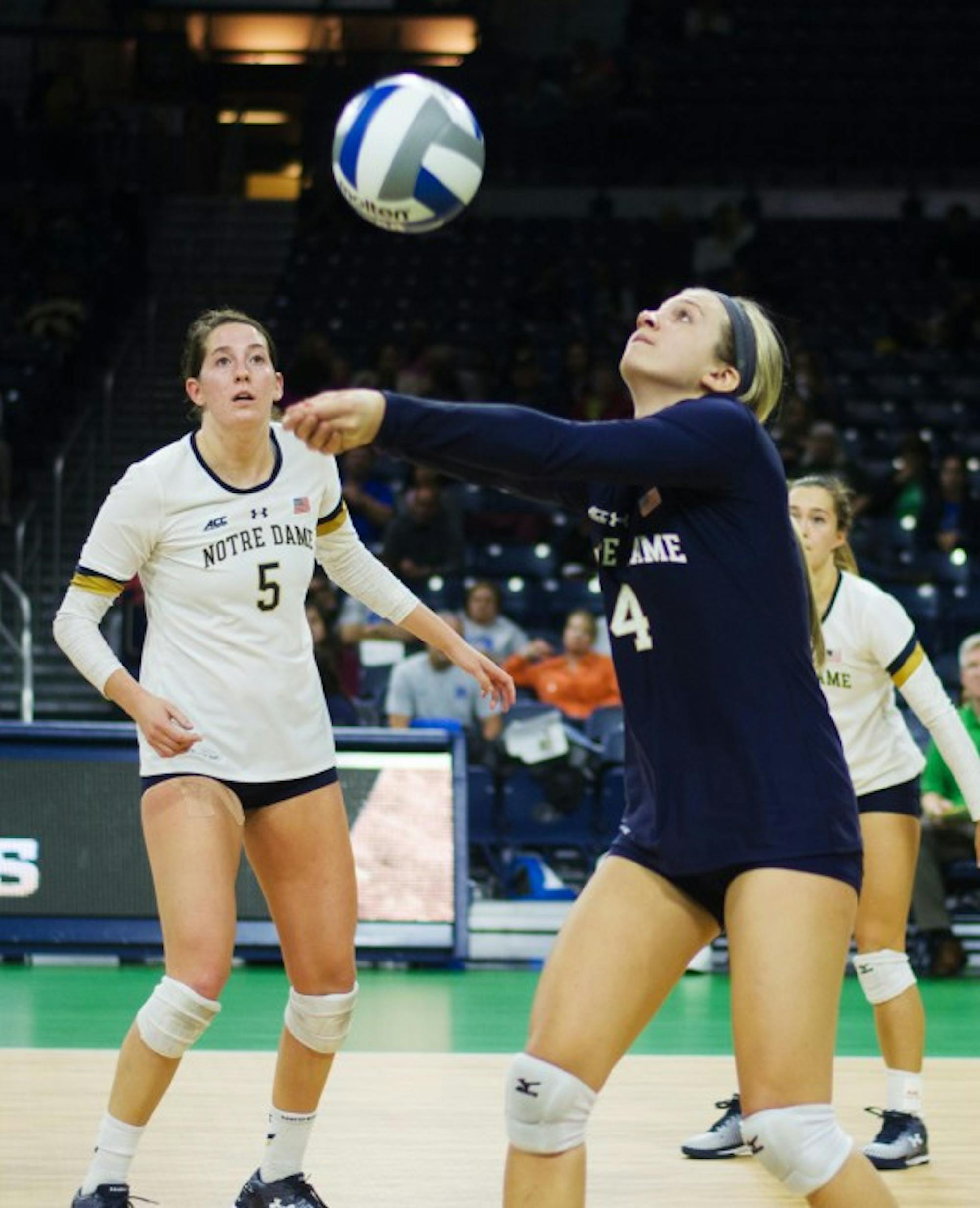 Irish sophomore libero Ryann DeJarld sets the ball during Notre Dame's 3-1 victory over Duke on Friday at Purcell Pavilion.