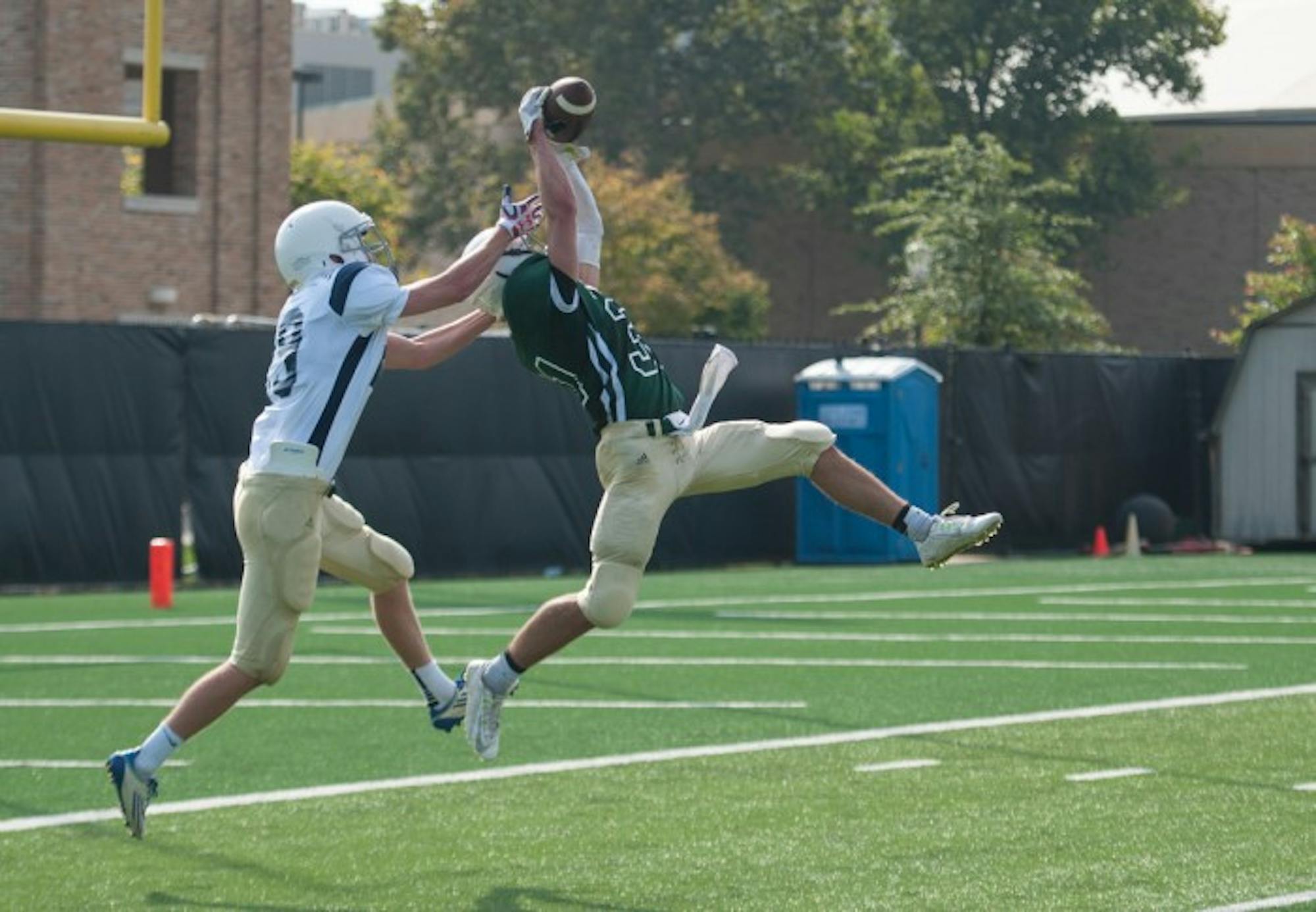 Fisher sophomore Alex Raymond makes an interception during St. Edward’s 14-0 win over Fisher on Sept. 25 at LaBar Practice Complex. The interception was one of four turnovers in the game.