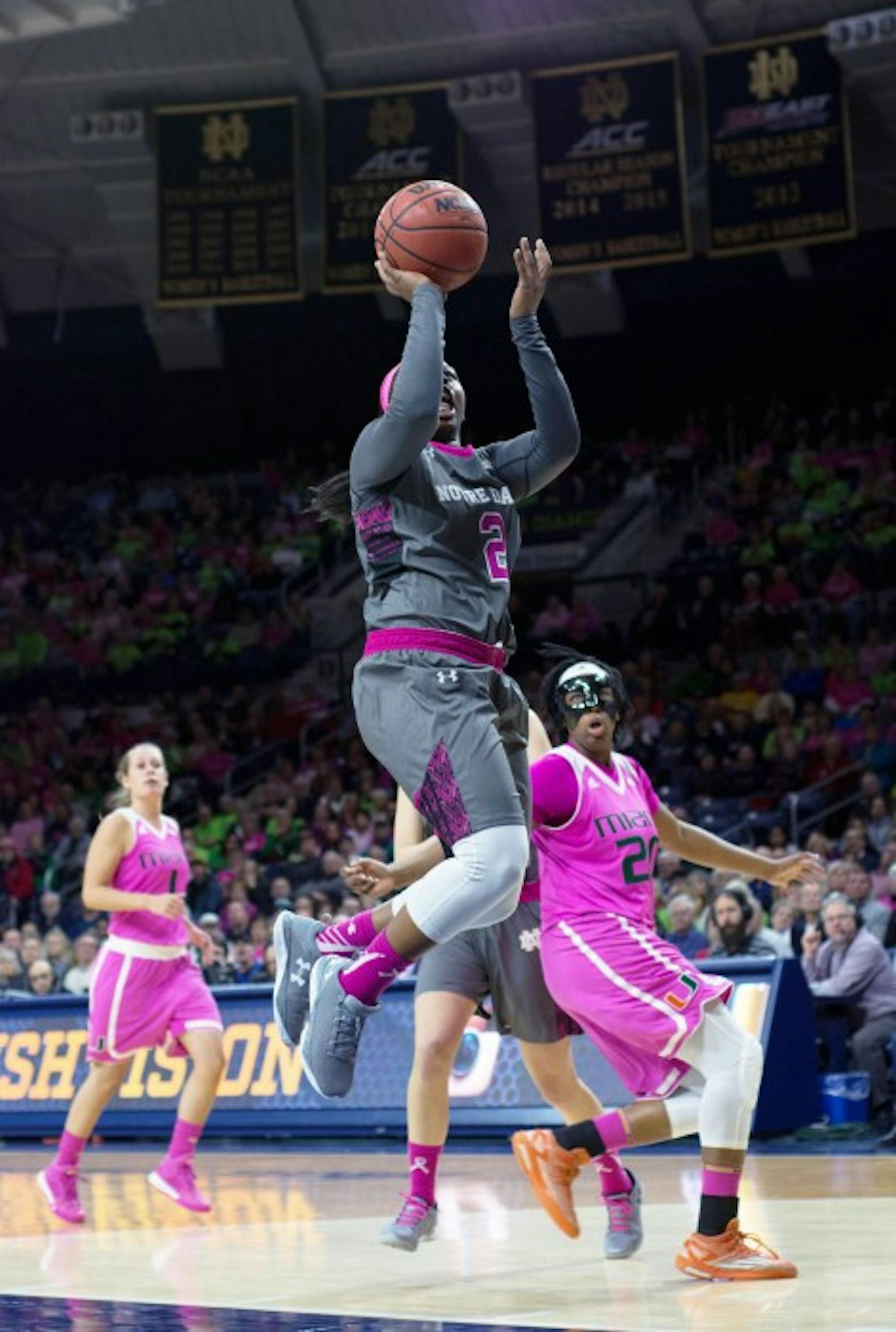 Irish freshman guard Arike Ogunbowale floats a shot while driving the lane during Notre Dame's 90-69 win over Miami (Fla.) on Sunday at Purcell Pavilion.