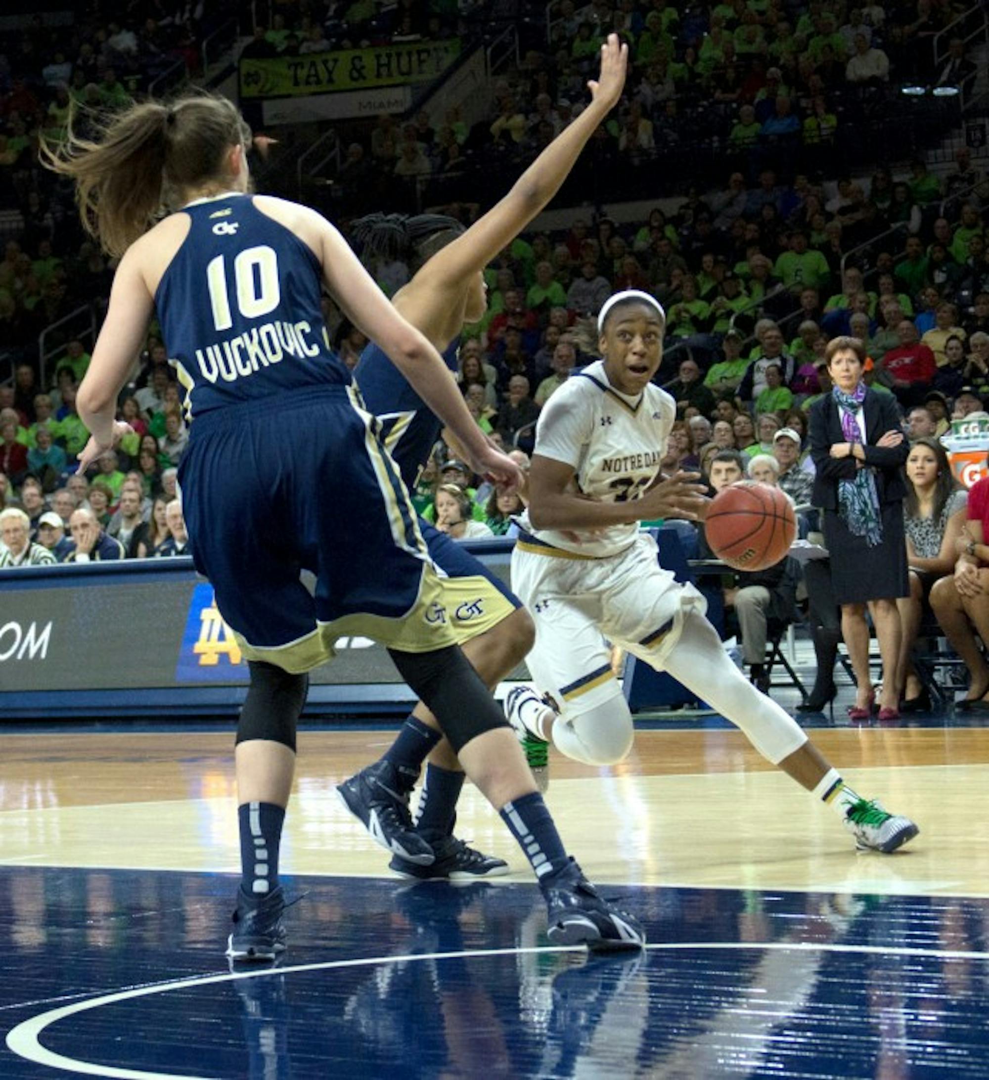 Irish junior guard Jewell Loyd drives against two Georgia Tech defenders during Notre Dame's 89-76 win Thursday at Purcell Pavilion.