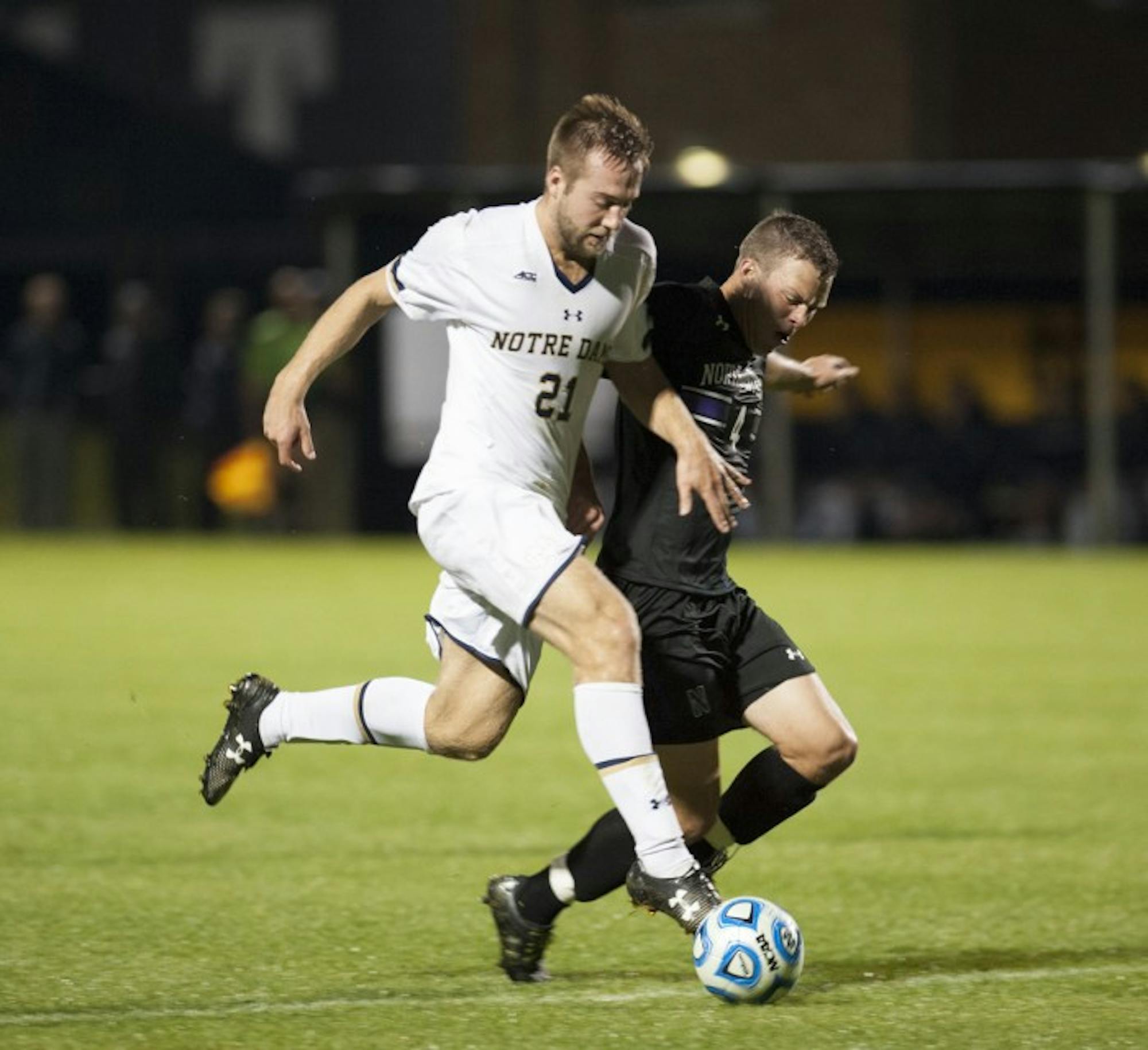 Irish senior forward Vince Cicciarelli battles for possession of the ball with a defender during Notre Dame’s 1-0 victory over Northwestern on Oct. 14, at Alumni Stadium.