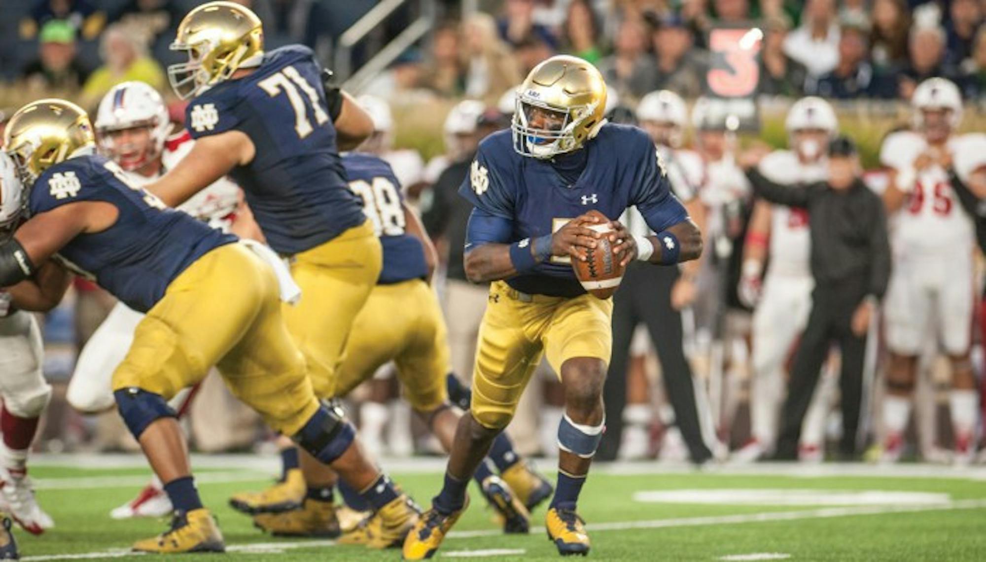Irish junior quarterback Brandon Wimbush rolls out of the pocket during Notre Dame's 52-17 victory over Miami (OH) on Sept. 30 at Notre Dame Stadium.