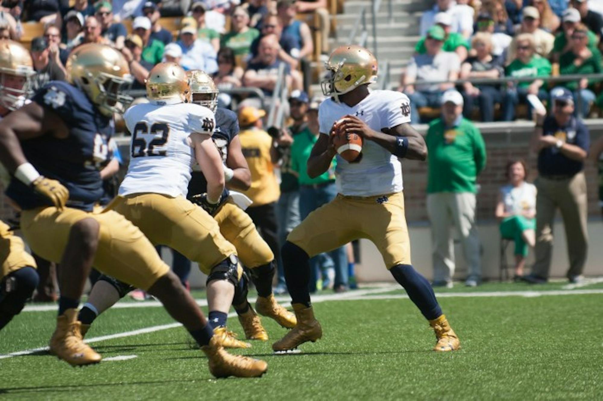 Senior quarterback looks for an open receiver during Notre Dame's Blue-Gold Game at Notre Dame Stadium.