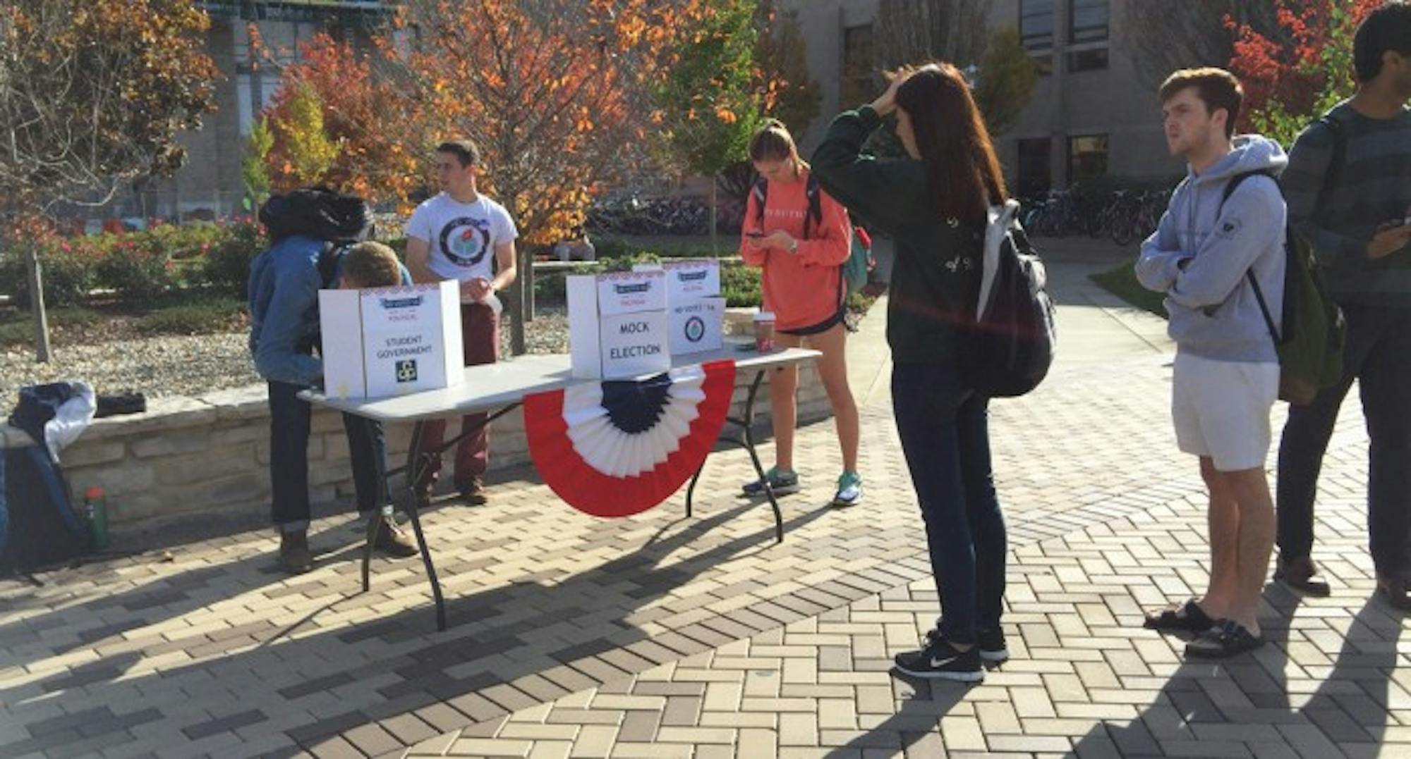 Students cast their ballots for presidential candidates in the mock election Tuesday afternoon outside DeBartolo Hall. NDVotes stationed three other polling booths across campus — in LaFortune Student Center, South Dining Hall and Geddes Hall — where students could vote electronically.