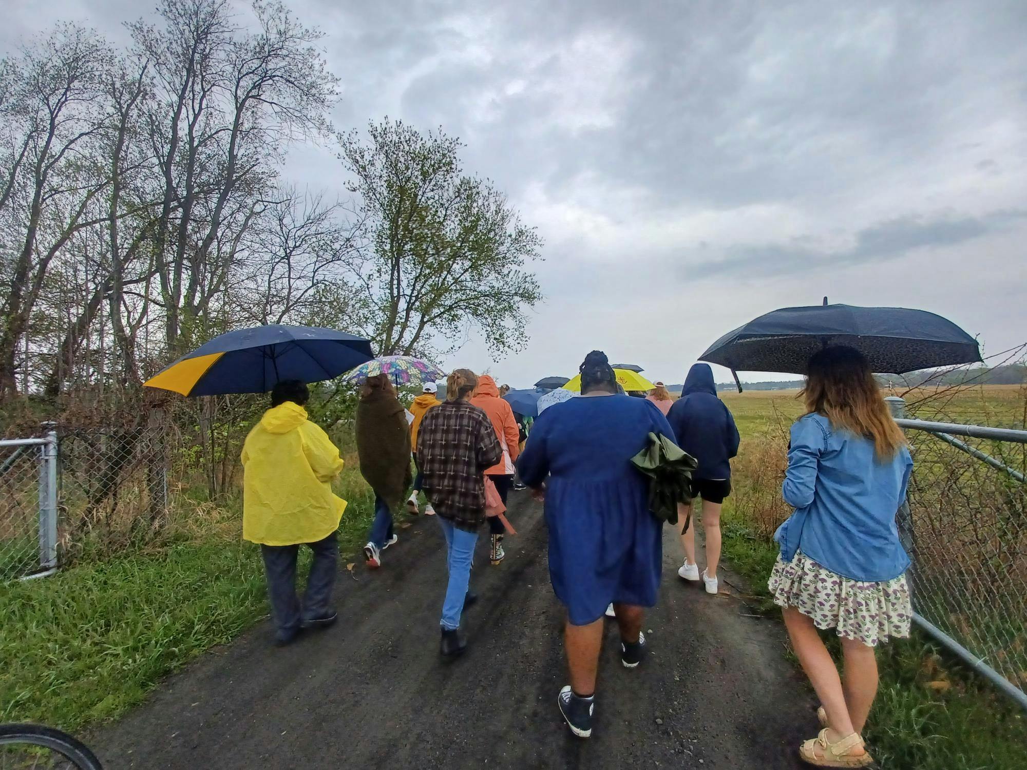 Students and faculty join for procession throughout the fields.jpg