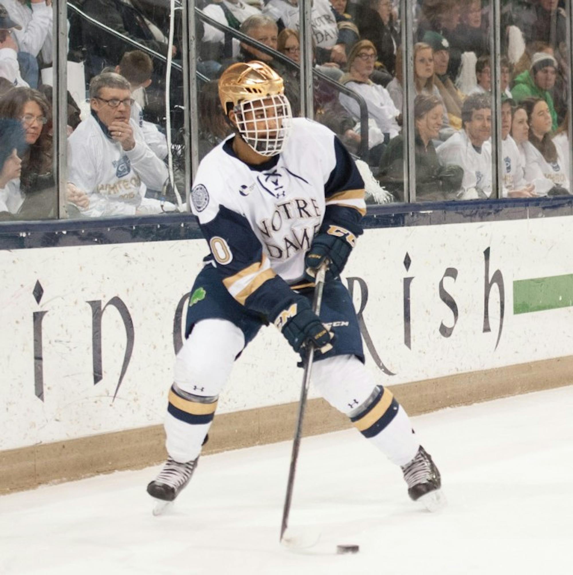 Junior defenseman Justin Wade surveys the ice during a  2-0 loss to Boston College on Feb. 27 at Compton Family Ice Arena.