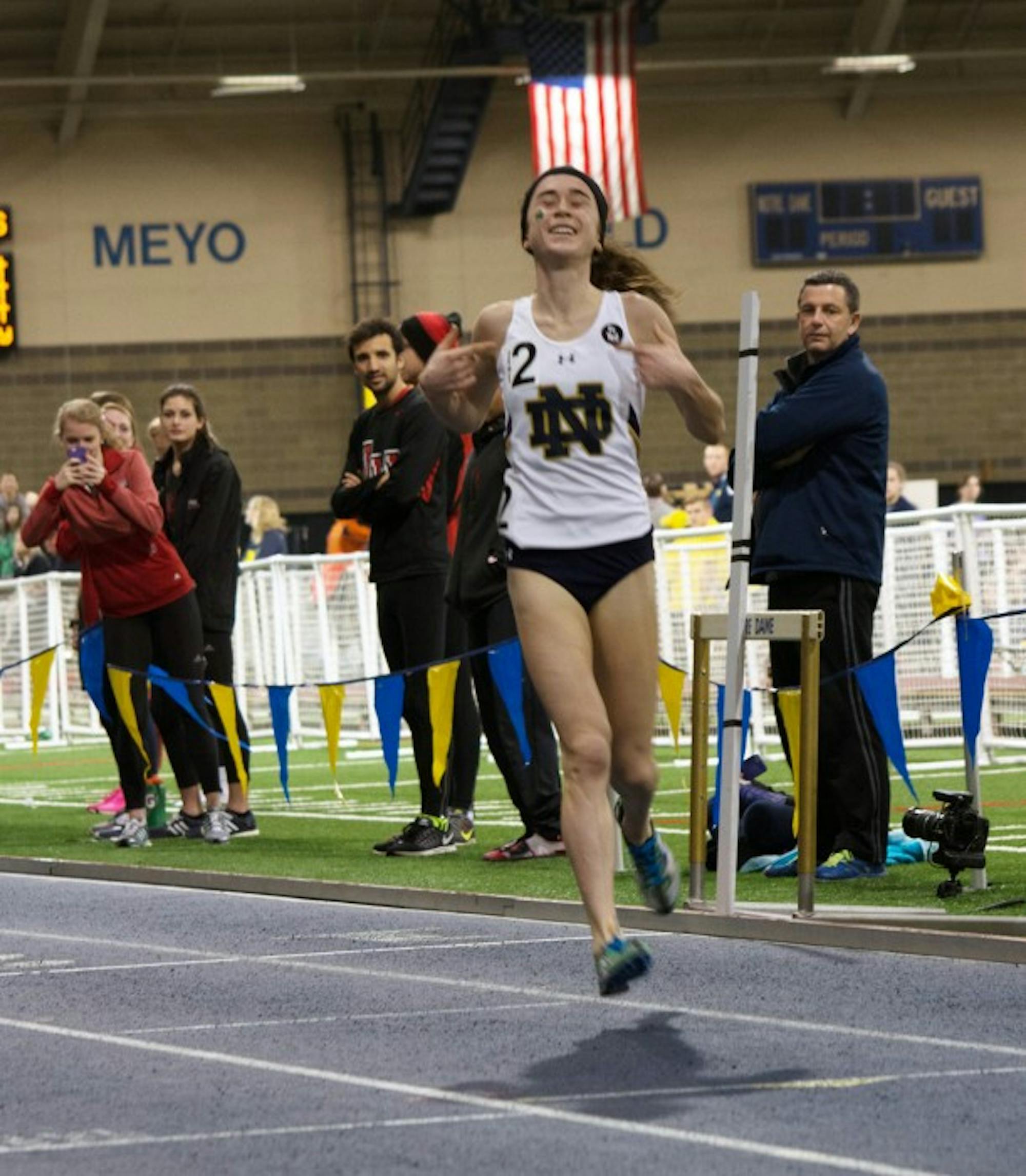 Senior Molly Seidel celebrates after winning the 3,000-meter run and setting a new school record at the Meyo Invitational on Feb. 6.