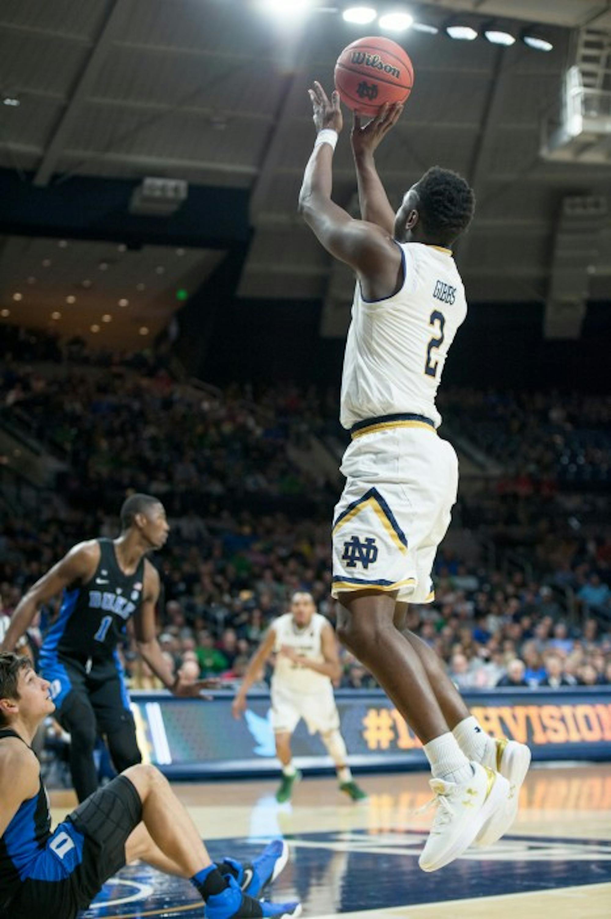 Irish freshman guard T.J. Gibbs shoots a wide-open jumper during Notre Dame’s 84-74 loss to Duke on Jan. 30 at Purcell Pavilion.