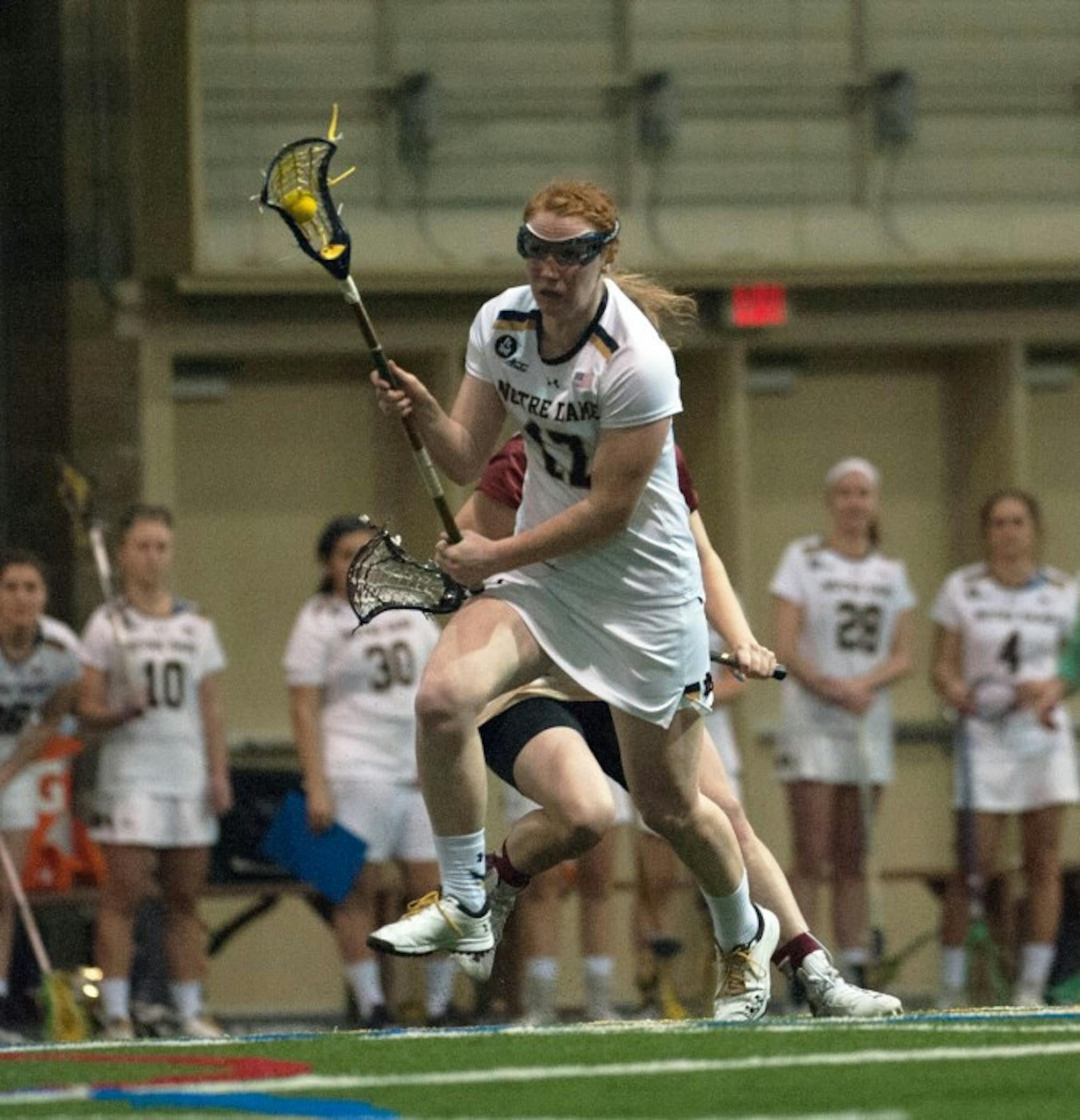 Irish graduate student defender Barbara Sullivan races upfield during Notre Dame’s 14-4 victory over Boston College on Sunday at Meyo Field. Sullivan registered a game-high five draw controls in the win.