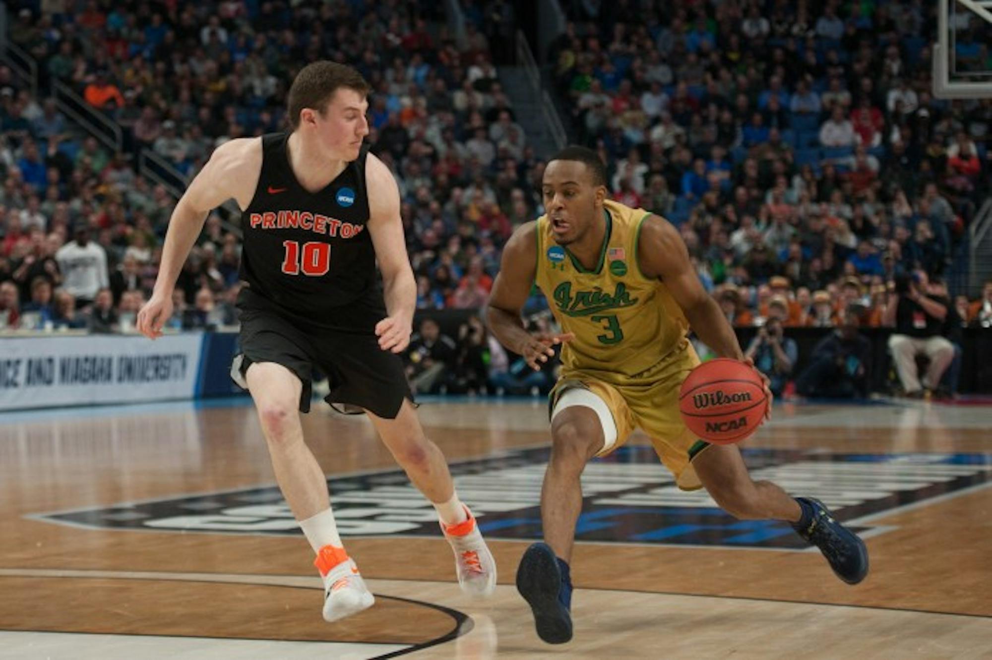 Irish senior forward V.J. Beachem drives down the court during Thursday’s 60-58 first-round win over Princeton in Buffalo, New York.