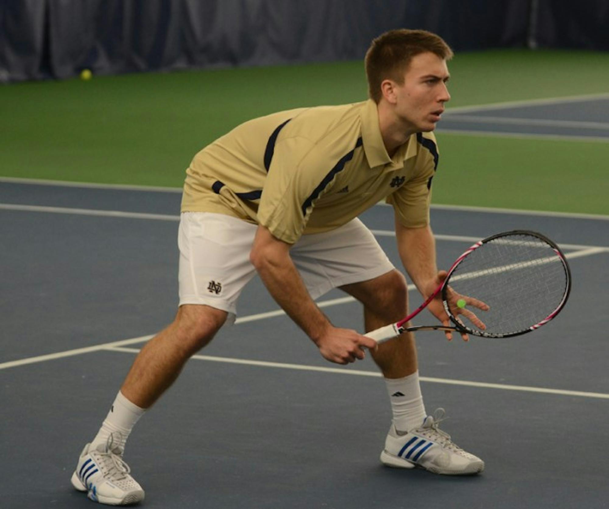 Senior Matt Dooley competes in a match against Marquette in Eck Tennis Pavilion on Jan. 19, 2013.