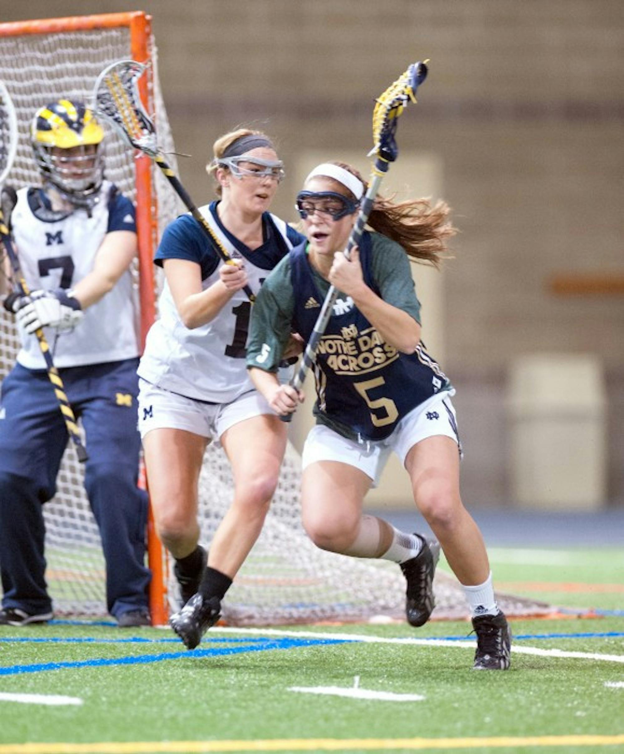 Irish junior attack Rachel Sexton works her way to the front of the net in Notre Dame’s 19-7 exhibition win over Michigan on Feb. 8, 2014.