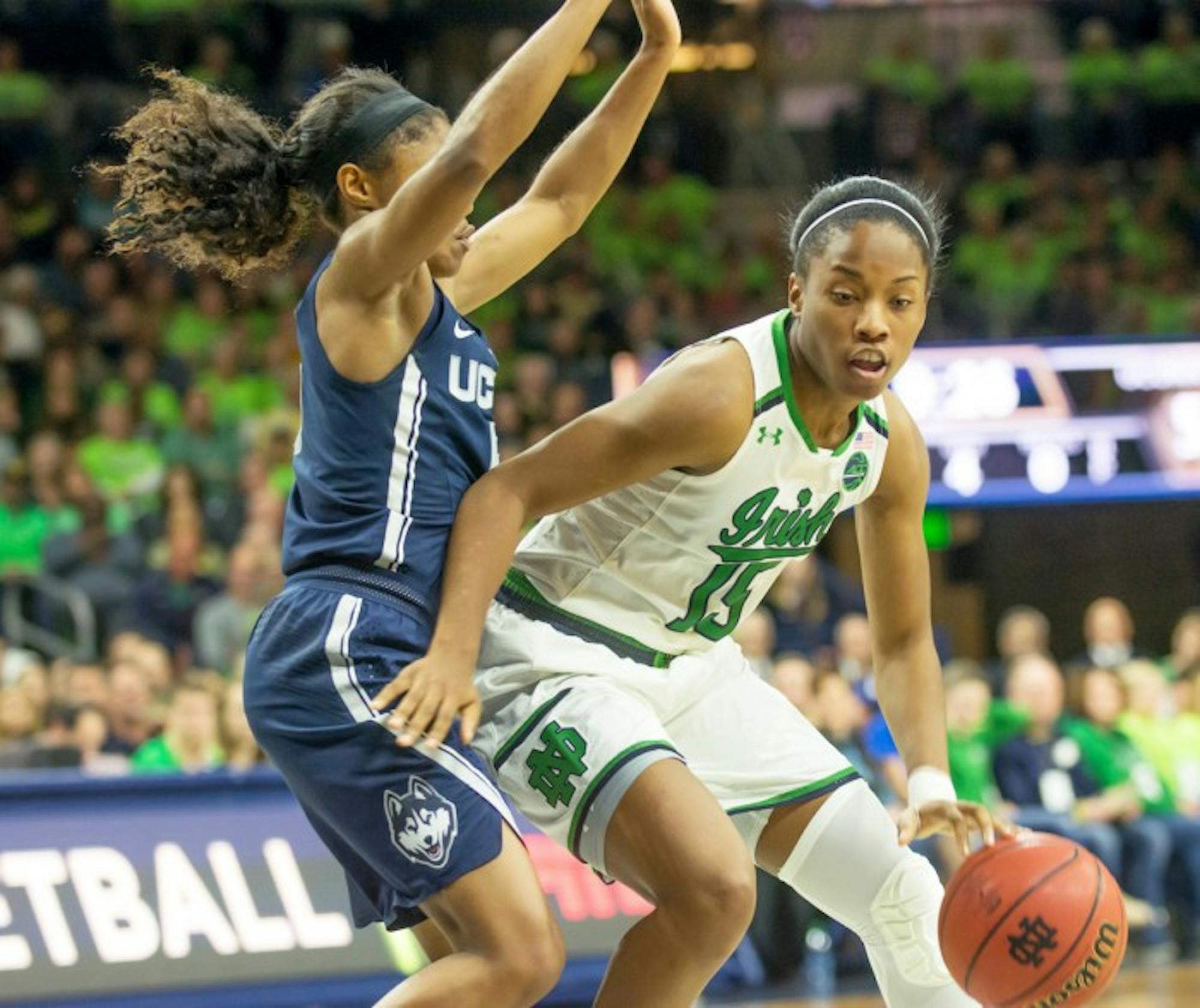 Irish senior guard Lindsay Allen dribbles around a defender in Notre Dame's 72-61 loss to the Huskies on Wednesday.