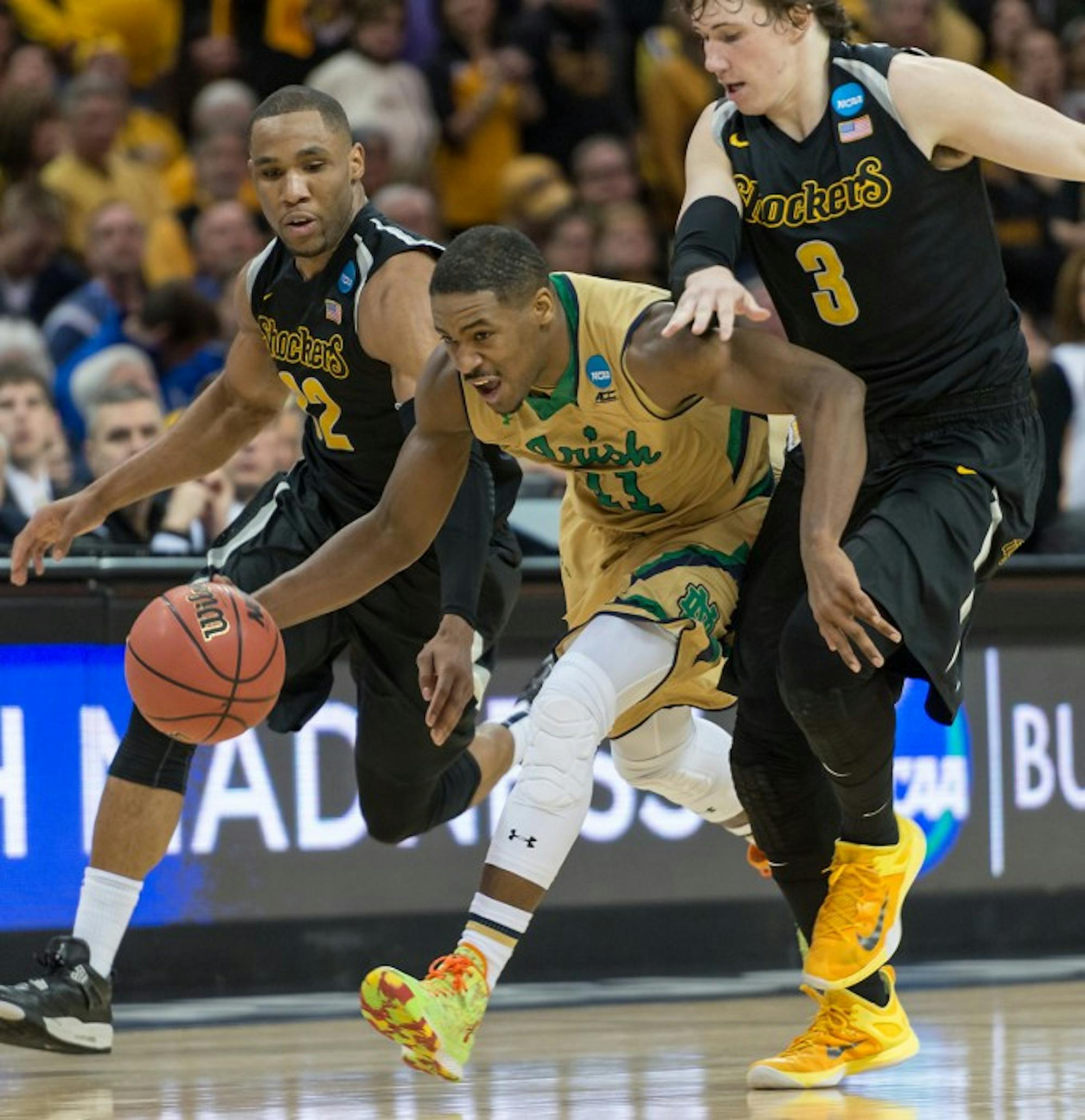 Irish sophomore guard Demetrius Jackson splits a pair of Wichita State defenders during Notre Dame's 81-70 victory in the Sweet 16.