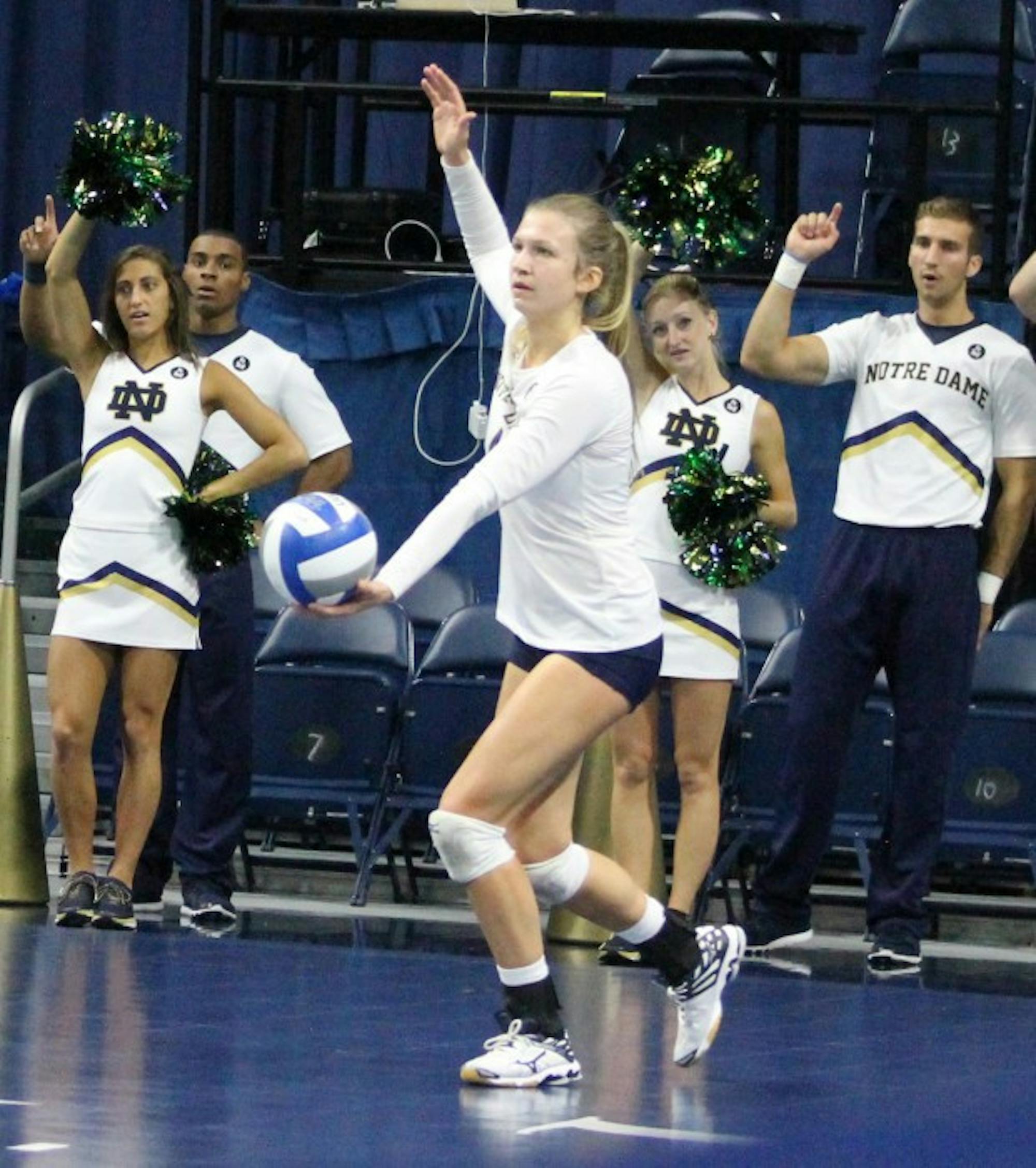 Freshman libero Ryann DeJarld sets up for a serve during Notre Dame’s 3-2 loss against Syracuse on Oct. 4 at Purcell Pavilion.