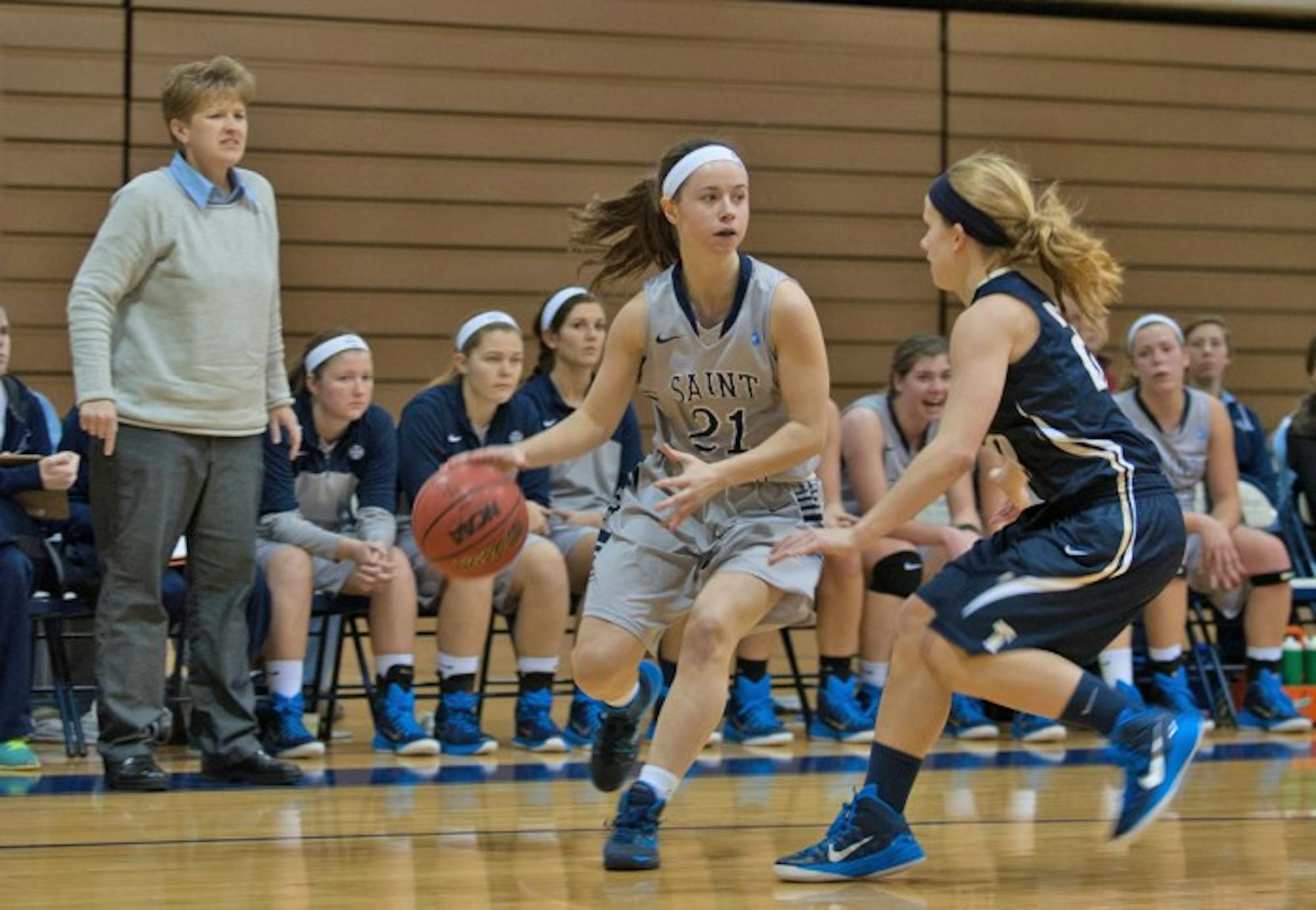 Saint Mary’s junior guard Sarah Macius looks to pass during the Belles’ 70-58 loss to Trine on Jan. 28.