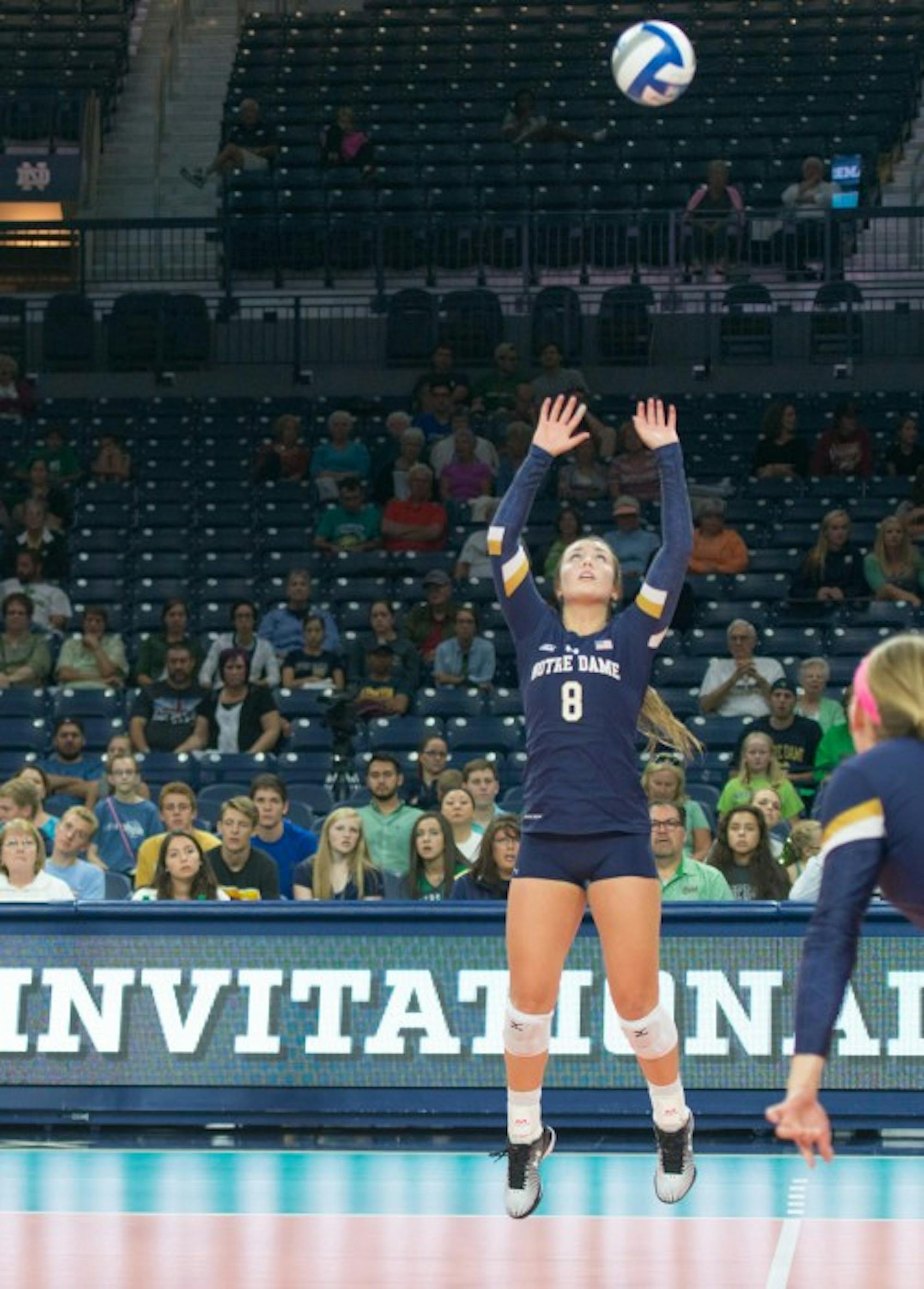 Irish junior setter Caroline Holt sets up a kill during Notre Dame’s 3-0 loss against Coastal Carolina on Sept. 2 at Purcell Pavilion. Holt registered at least 30 assists in each of Notre Dame’s wins this weekend.