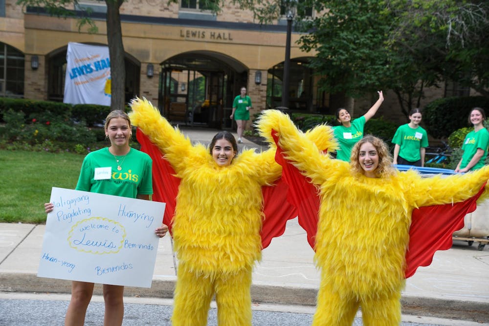 Lewis Hall committee members dressed as mascots for annual orientation.jpg