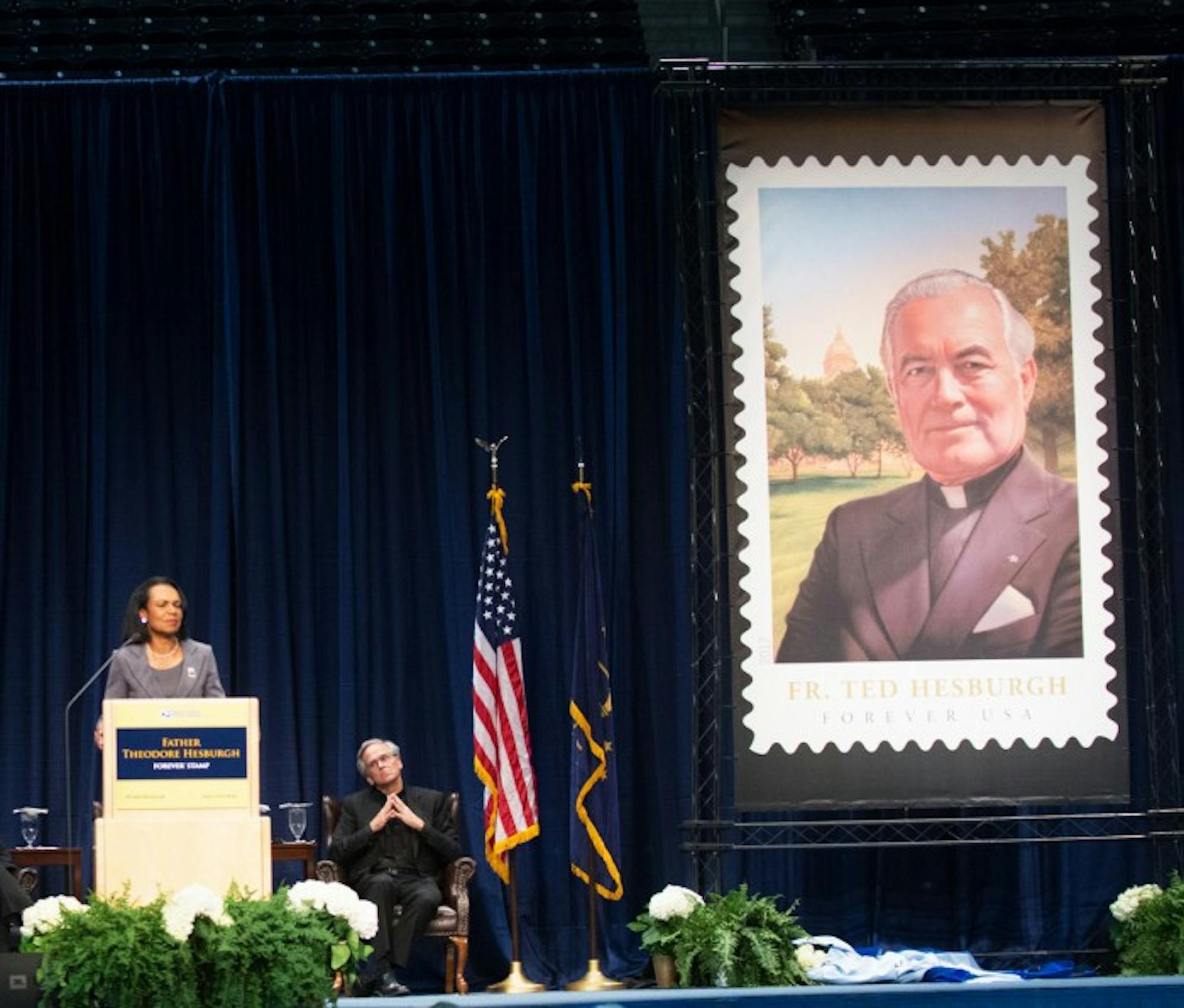 Former Secretary of State Condoleezza Rice speaks at a ceremony unveiling University President Emeritus Fr. Theodore Hesburgh's stamp on Friday in the Purcell Pavillion.