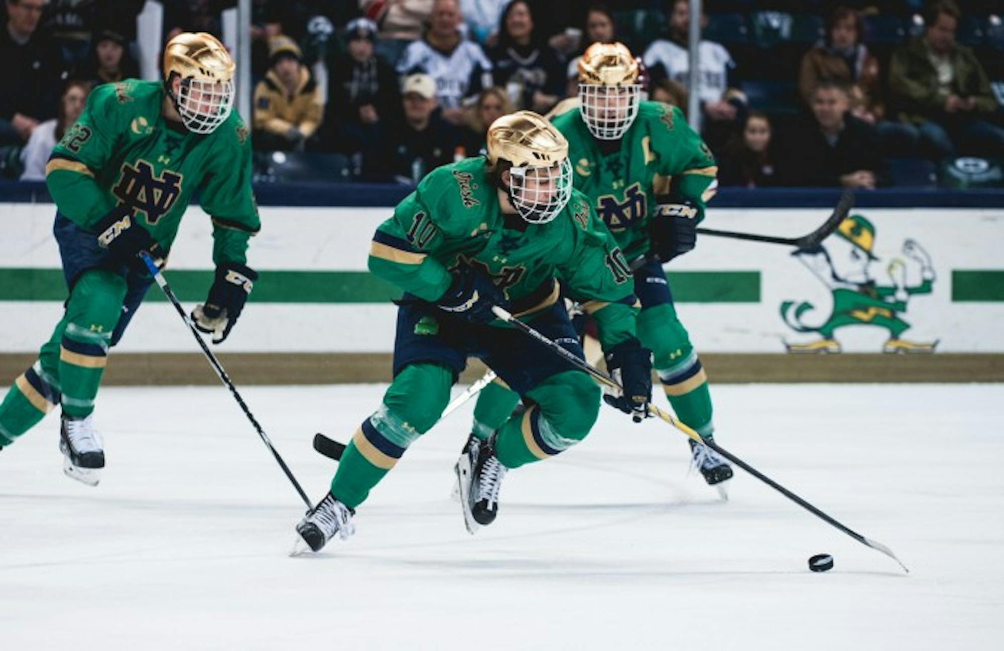 Sophomore left winger Anders Bjork controls the puck during Notre Dame’s 3-1 win over Boston College on Feb. 28.
