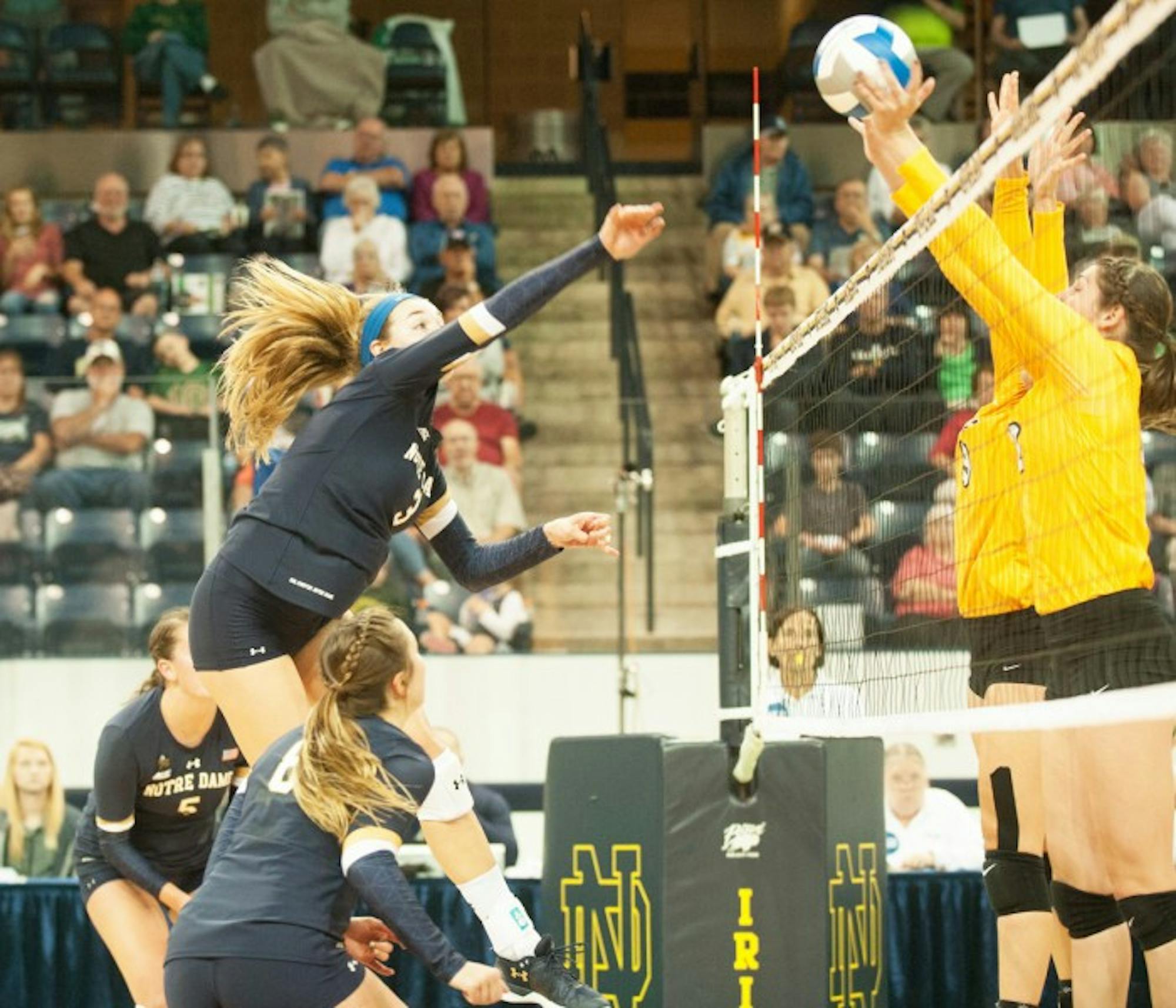 Irish senior middle blocker Sam Fry goes up for a kill during Notre Dame’s 3-1 win over Valparaiso on Aug. 25 at Compton Family Ice Arena. Fry was name ACC Player of the Week this week.