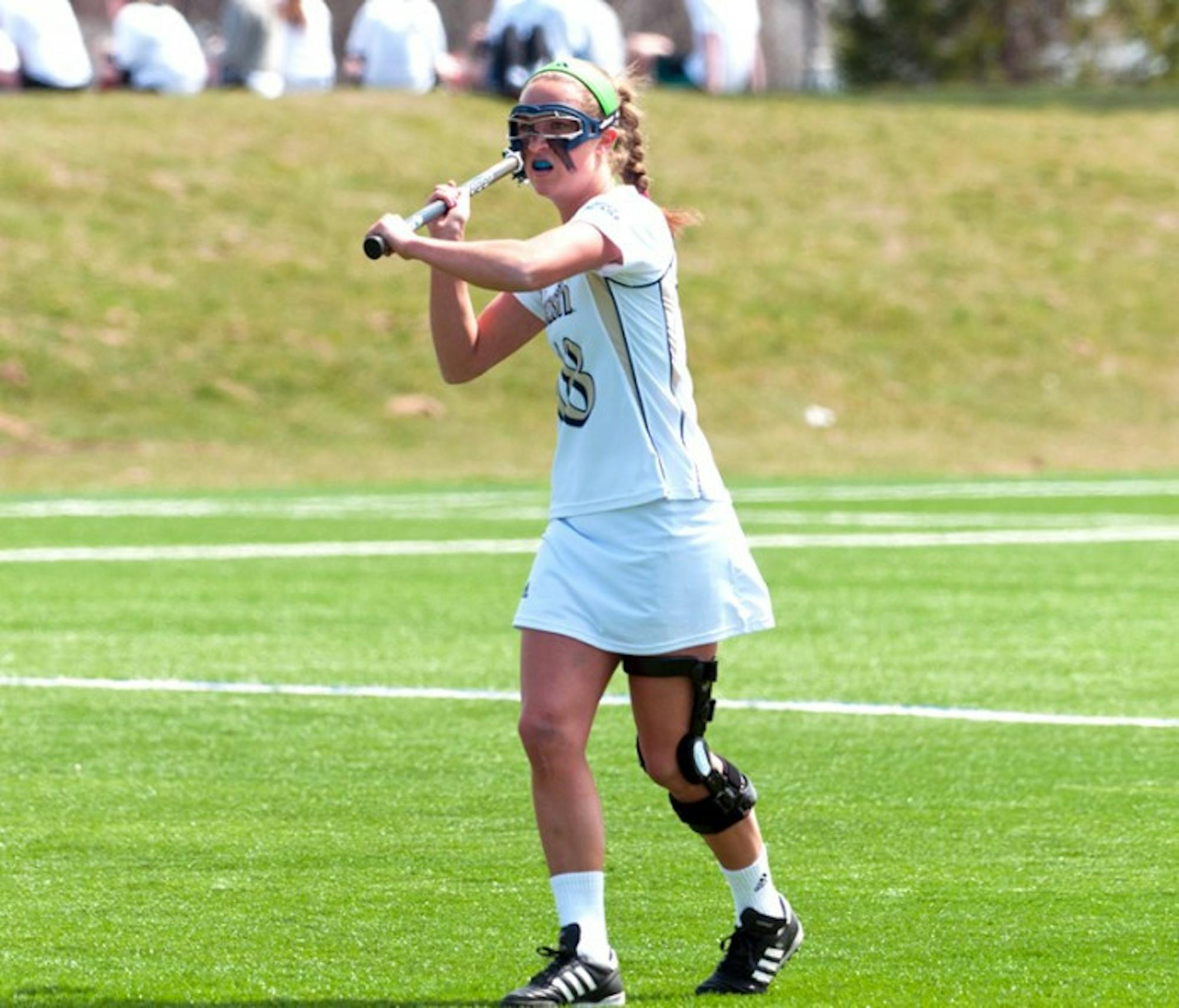 Irish senior attack Lindsay Powell looks to pass during Notre Dame’s 13-12 win over Georgetown last season on April 14.