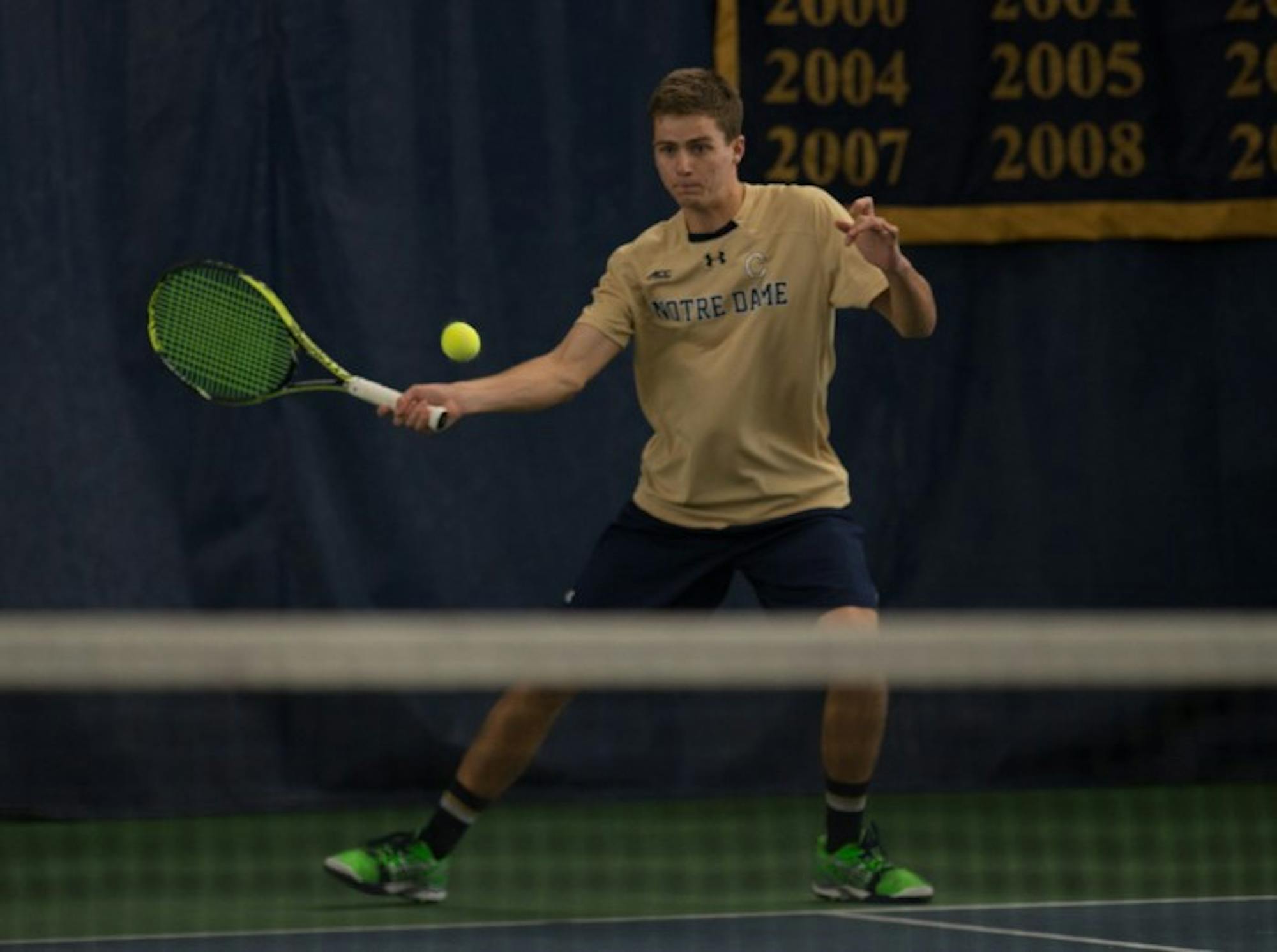 Irish junior Quentin Monaghan returns a shot during Notre Dame’s 4-3 win over Oklahoma State on Jan. 24 at Eck Tennis Pavilion.