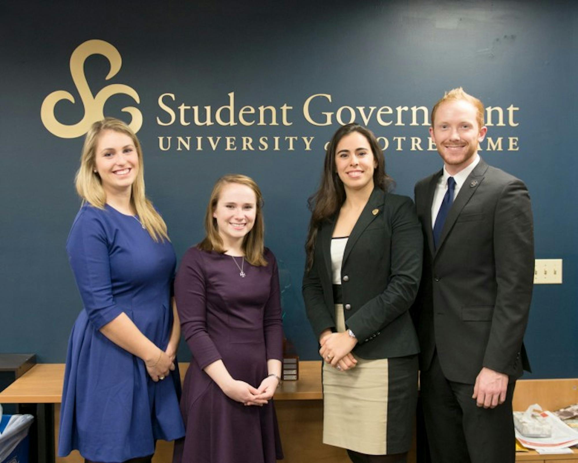 McKenna Schuster (left), Sam Moorhead, Lauren Vidal and Matthew Devine worked to enhance community on their respective campuses through the 29 for 29 program at Notre Dame and the SMC card initiative.