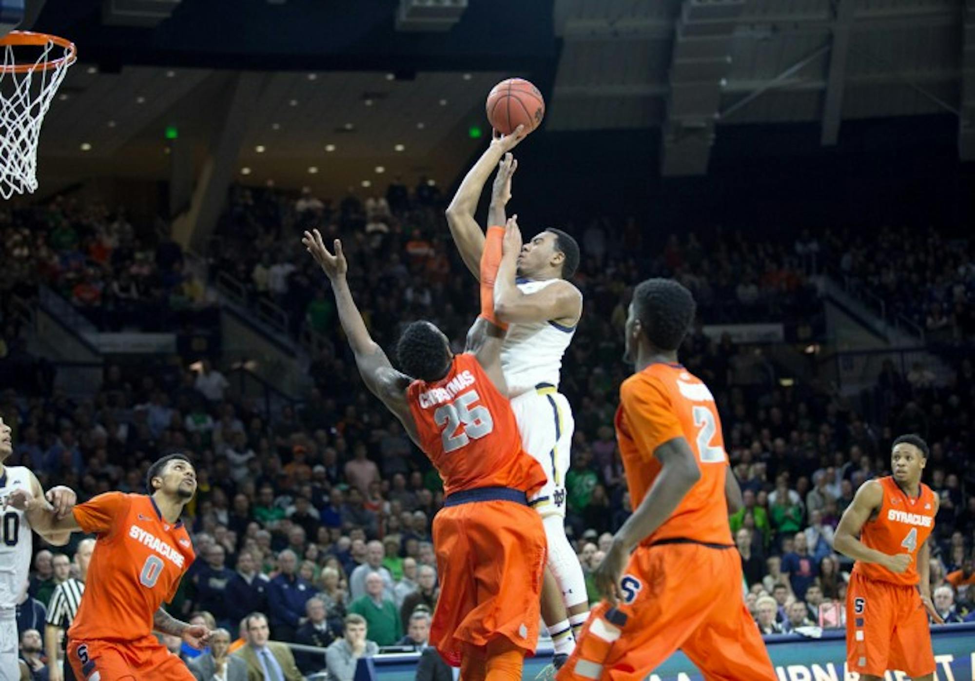 Sophomore forward Bonzie Colson goes over a defender for a shot    attempt in Notre Dame’s 65-60 loss to Syracuse on Feb. 24.