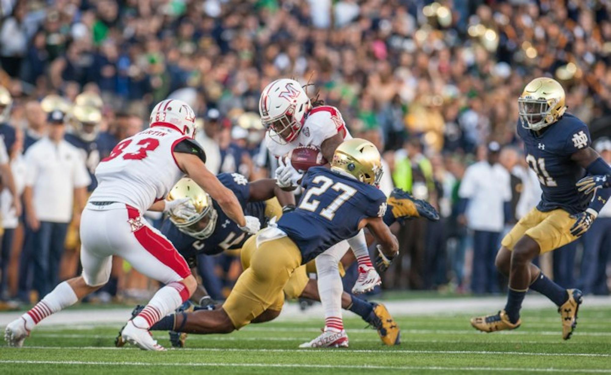 Irish sophomore cornerback Julian Love makes a tackle during Notre Dame’s 52-17 victory over Miami (OH) on Sept. 30. Love has 27 tackles and one interception on the year.