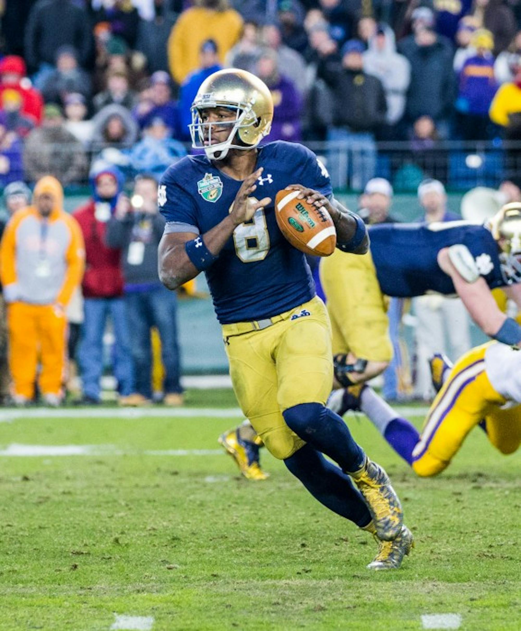 Irish junior quarterback Malik Zaire surveys the field during Notre Dame's 31-28 win over LSU in the Franklin American Mortgage Music City Bowl at LP Field in Nashville, Tennessee.
