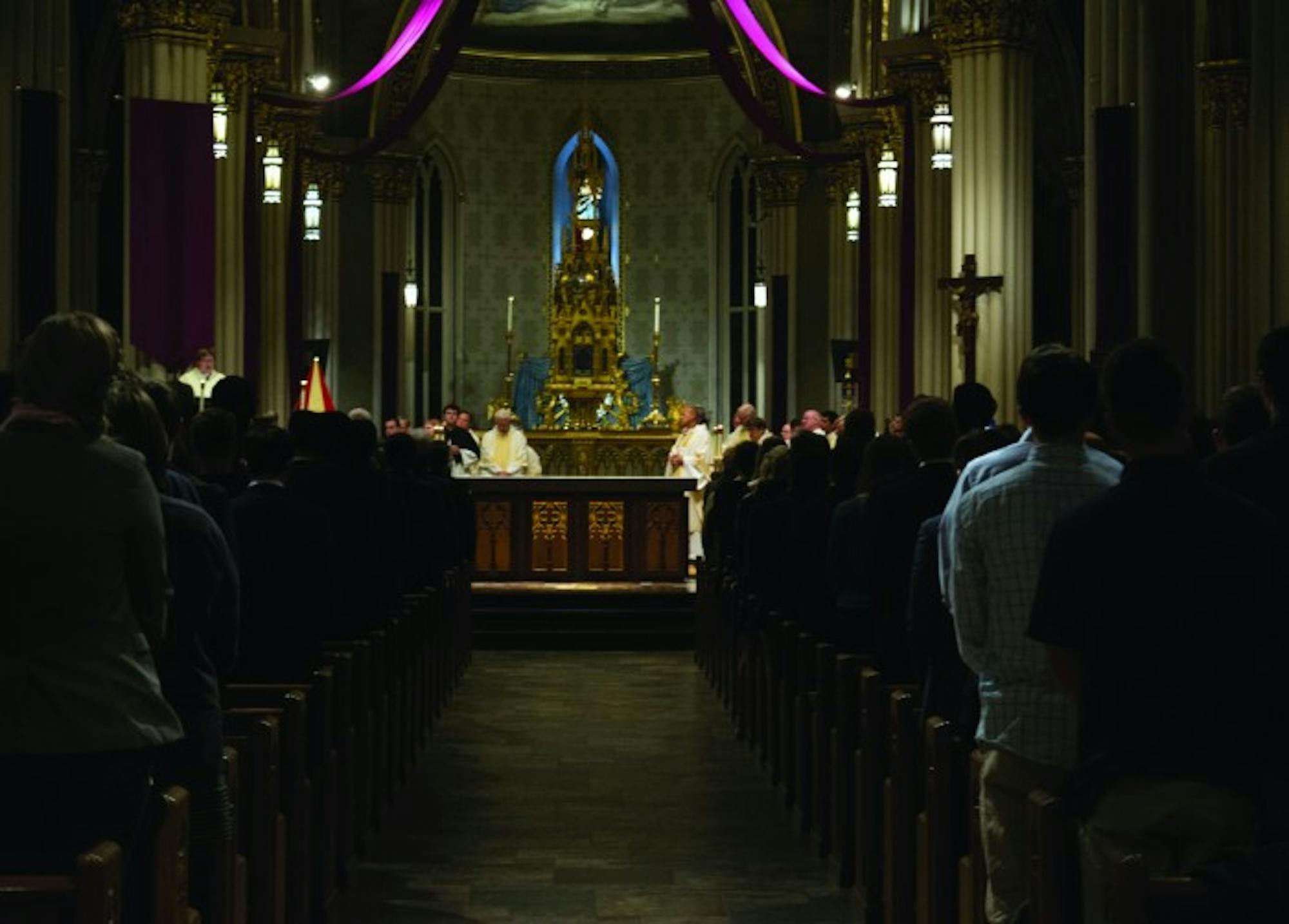 Students and other members of the Notre Dame community attended Mass at the Basilica of the Sacred Heart on Wednesday night in memory of junior Theresa Sagartz, who died last week.