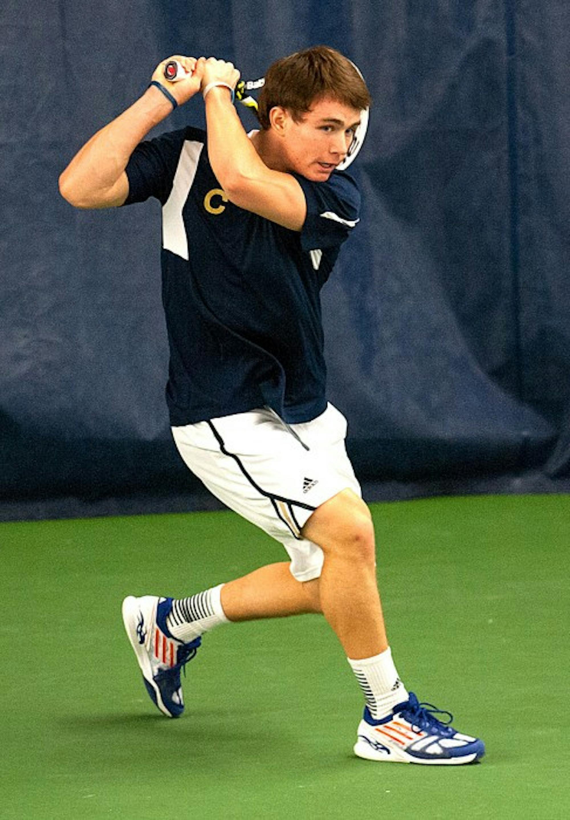 Senior captain Greg Andrews returns a shot against Kentucky’s Tom Jomby (not pictured) on Feb. 2 at the Eck Tennis Pavilion. Andrews and the Irish take on Northwestern today at the Combe Tennis Center in Evanston, Ill.