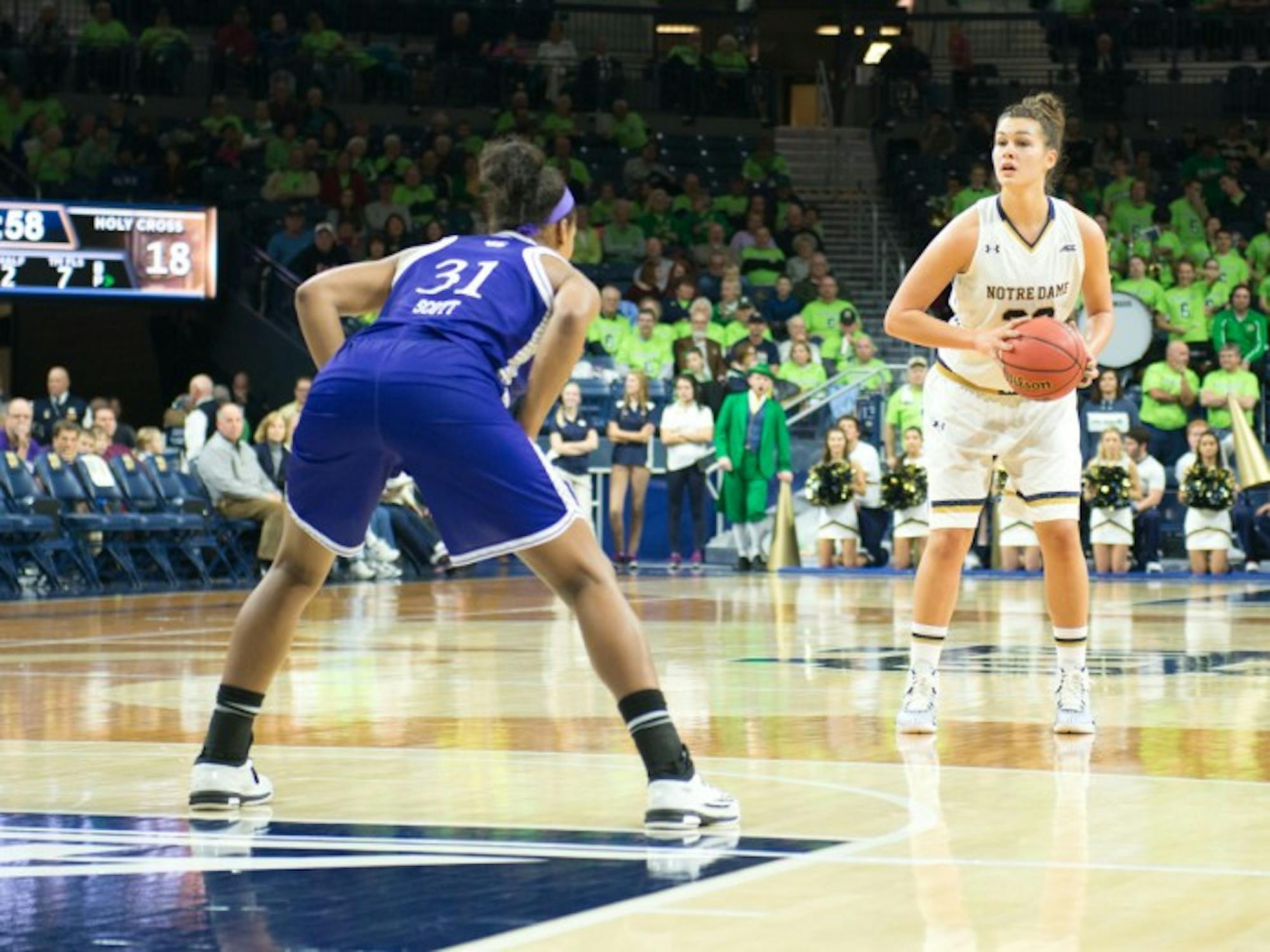 Notre Dame freshman forward Kathryn Westbeld looks up for a pass during the 104-29 win over Holy Cross in the Purcell Pavilion on Nov. 23.