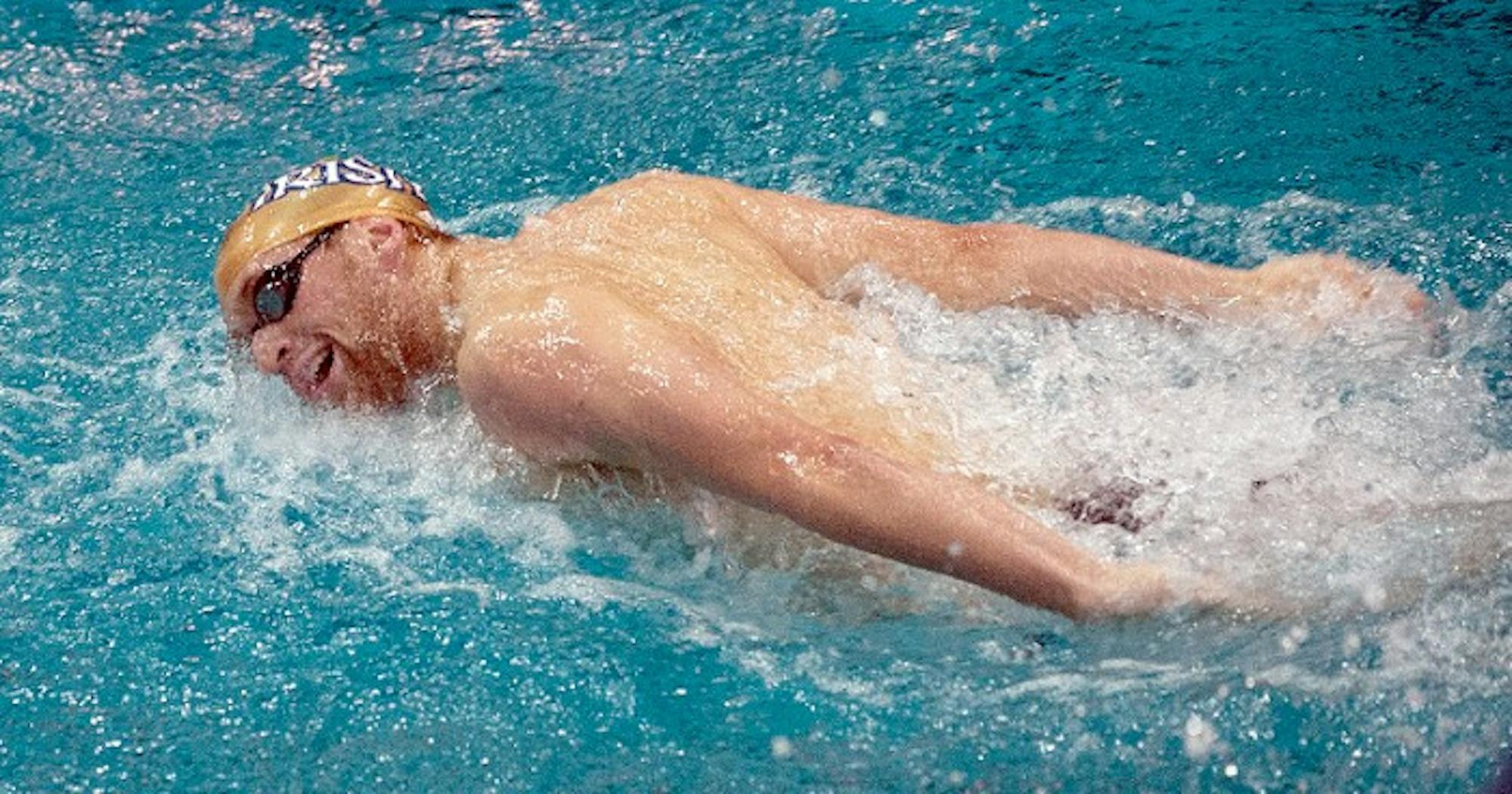 Junior John Williamson competes in the 200-yard butterfly at Notre Dame’s dual meet against Michigan State on Nov. 15.