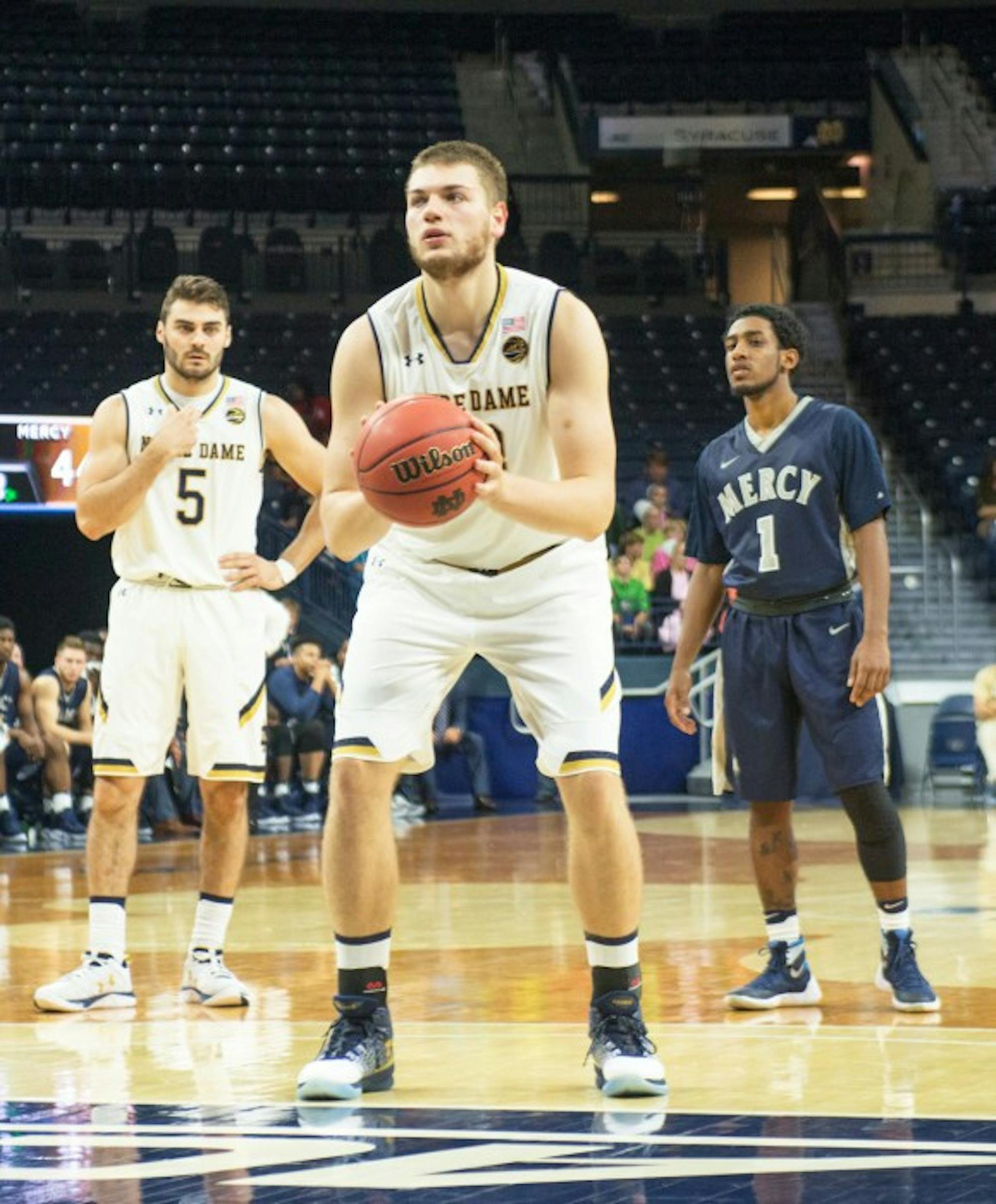 Junior center Martinas Geben prepares for a free throw during Notre Dame’s 119-58 victory over Mercy on Tuesday at Purcell Pavilion. Geben totaled 12 points and nine rebounds in the exhibition matchup.