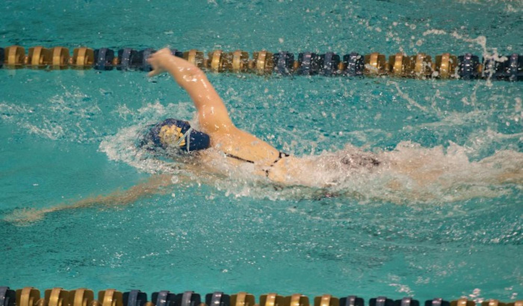 Sophomore Abbie Dolan races to the finish of the 200-yard freestyle during Notre Dame’s 153.5-146.5 victory over Louisville on Oct. 7 at Rolfs Aquatic Center. Dolan owns the team record in the 200 free.