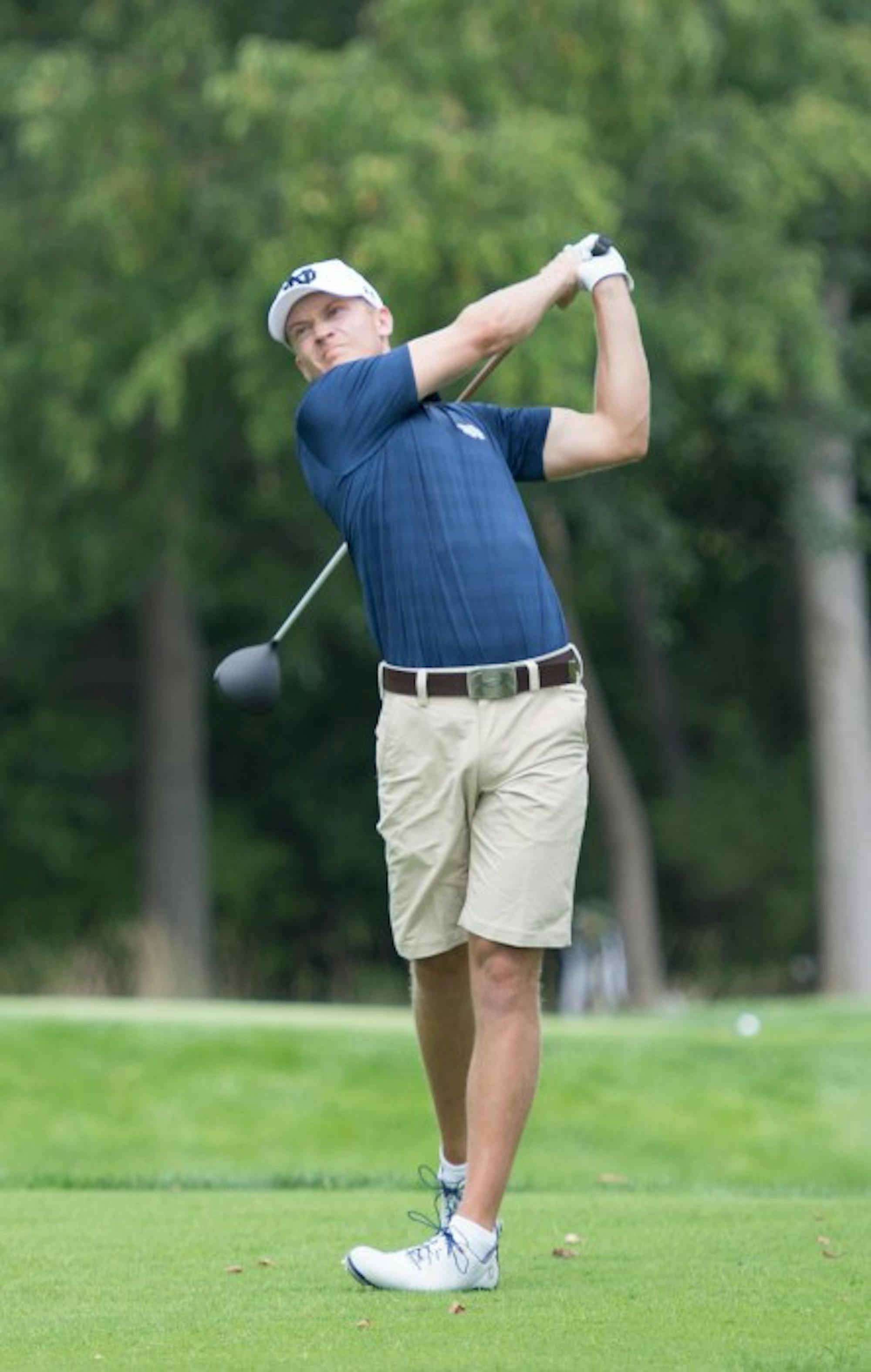 Irish senior David Lowe follows through on a drive during the Notre Dame Kickoff Challenge at the Warren Golf Course on August 31. The team traveled to Minnesota this past weekend for the Gopher Invitational.
