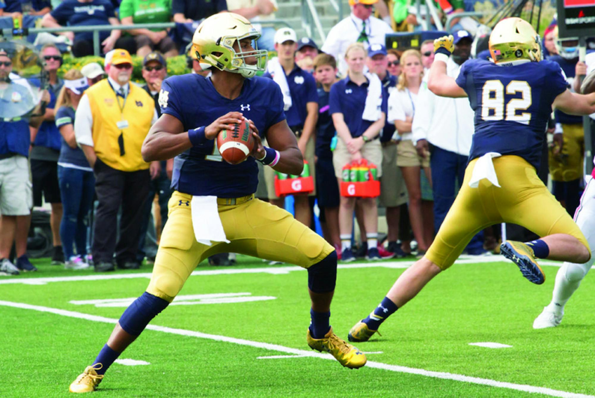 Irish sophomore quarterback DeShone Kizer fires a pass downfield during Notre Dame’s 62-27 home       victory over Massachusetts on Saturday.