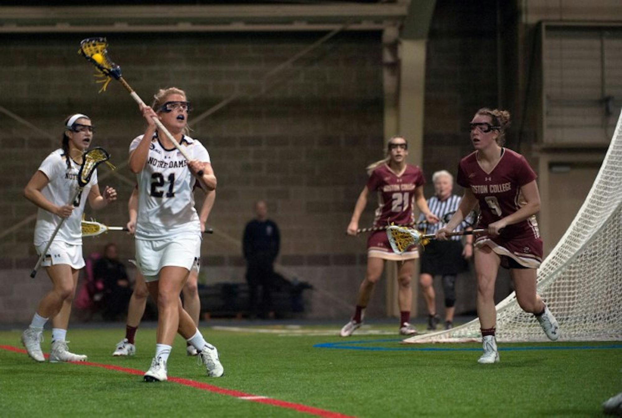 Irish junior attack Grace Muller searches for an open teammate in Notre Dame’s win over Boston College. Muller scored a goal in the win.