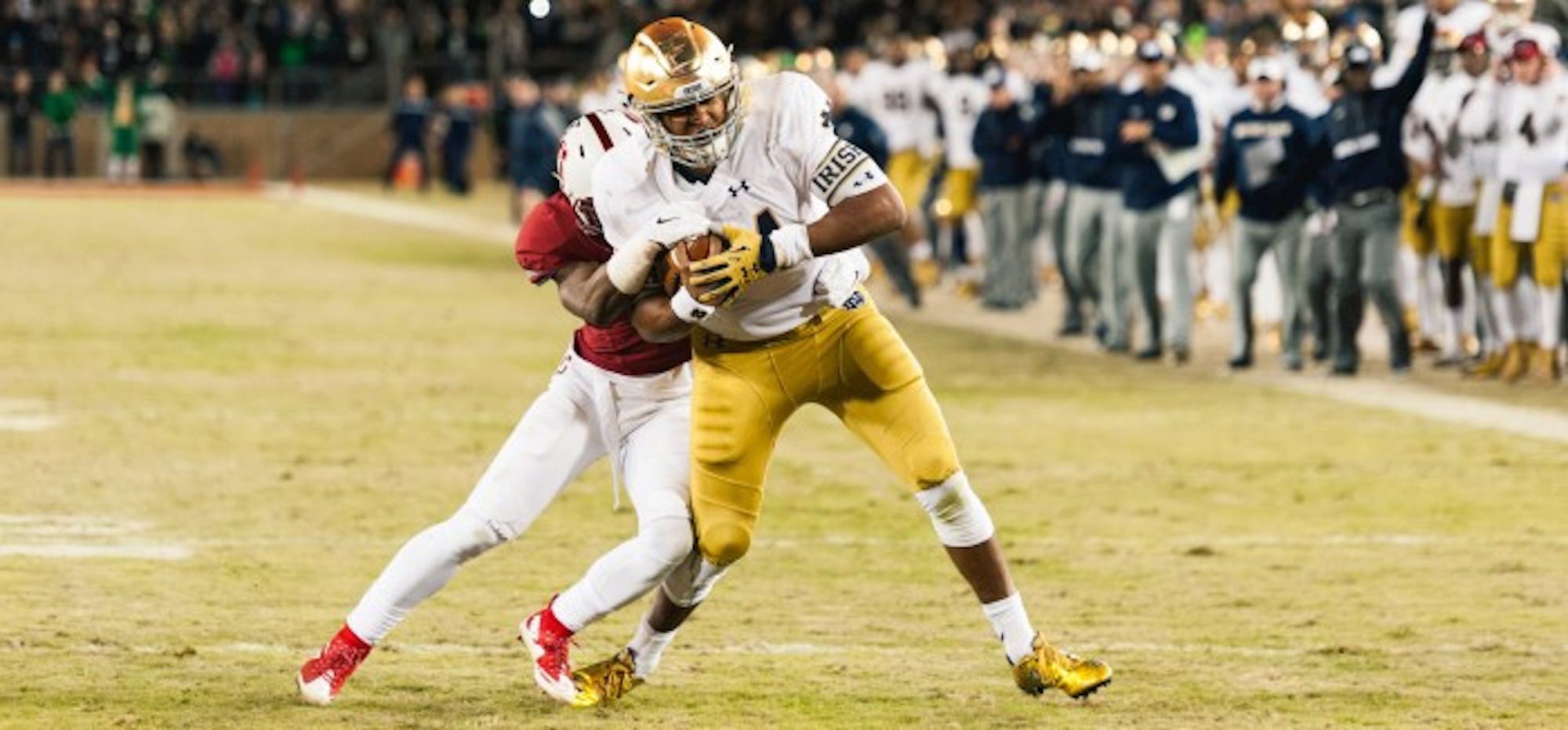 Irish sophomore quarterback DeShone Kizer scores the game-tying touchdown with 30 seconds left Saturday at Stanford Stadium. Notre Dame went ahead on the extra point but lost in regulation, 38-36.